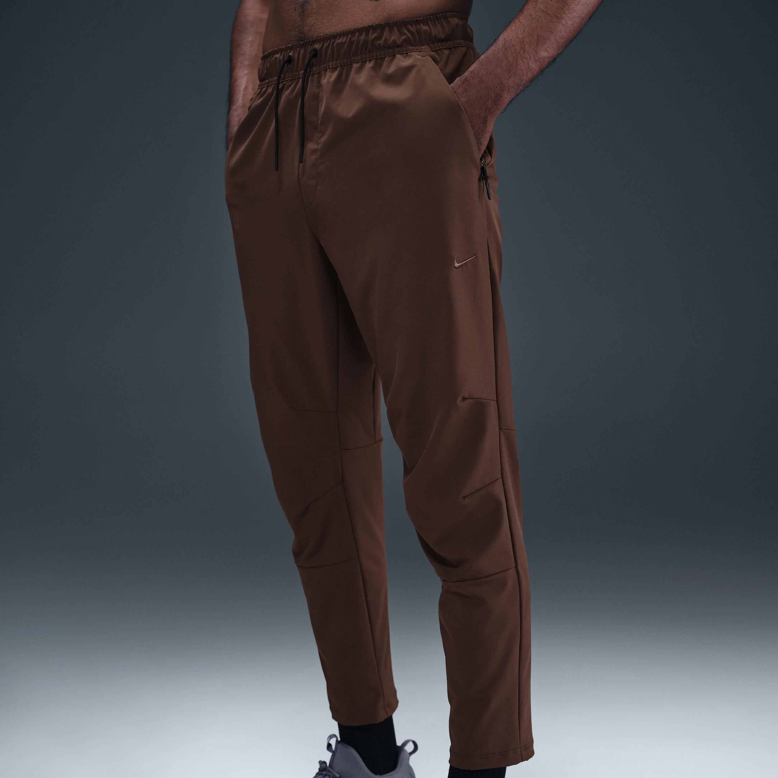 Nike Mens Unlimited Dri-FIT Tapered Leg Versatile Pants | FB7546-237 Product Image