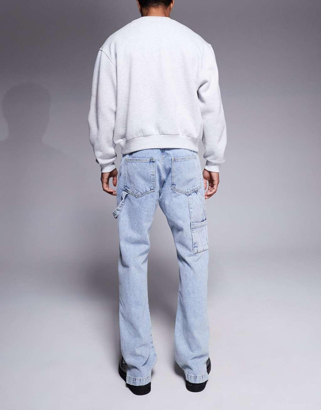 The Couture Club carpenter rivet detail jeans in blue wash  Product Image