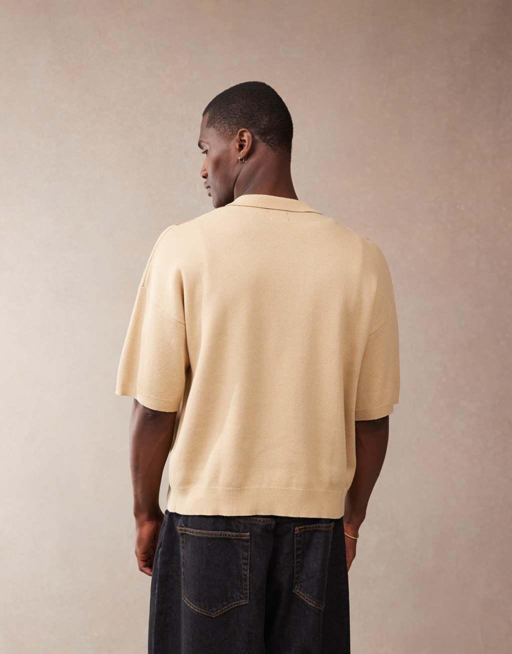 ASOS DESIGN relaxed boxy fit knit button through polo with argyle pattern in beige Product Image