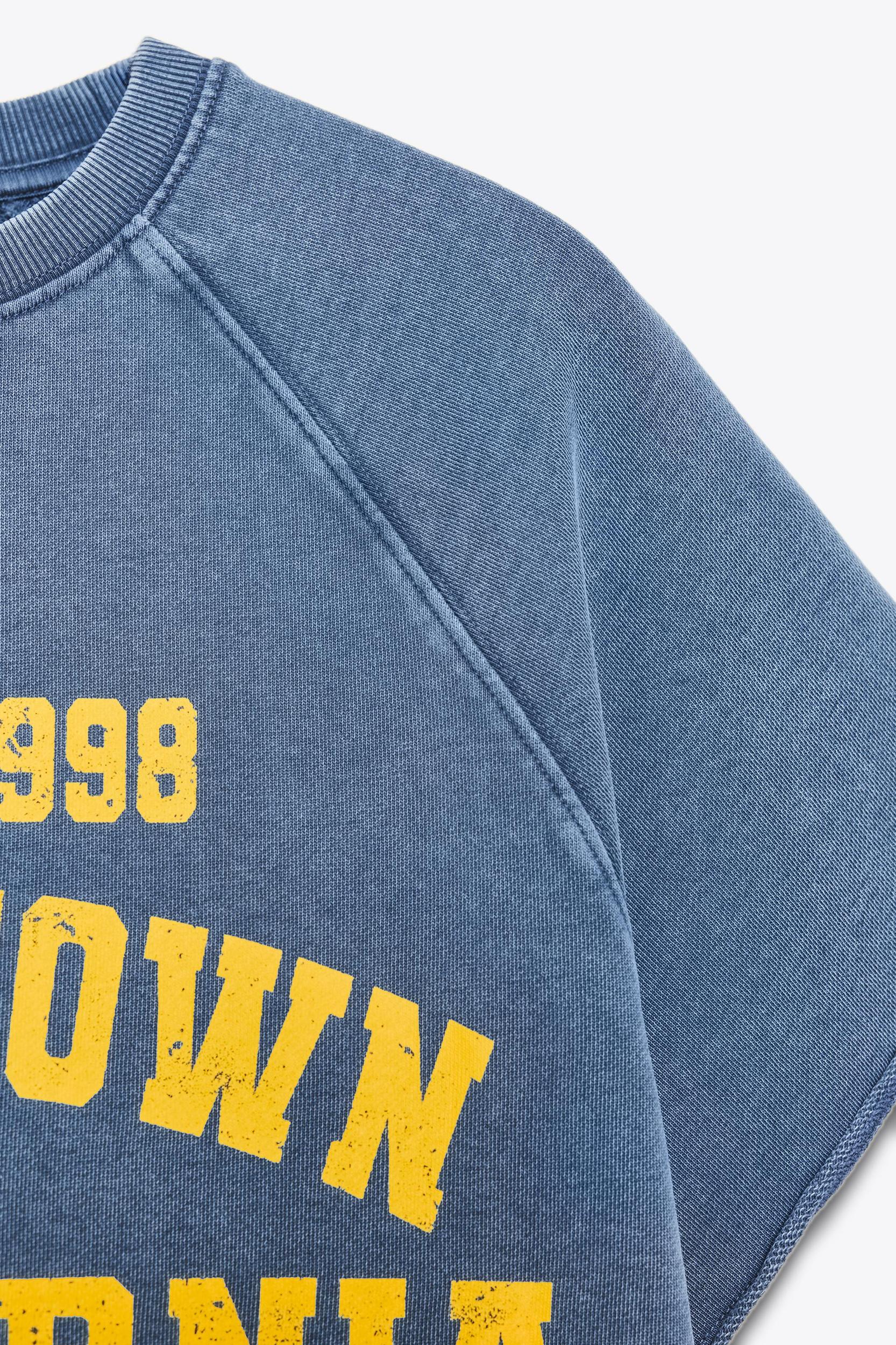 WASHED EFFECT TEXT PLUSH SWEATSHIRT Product Image