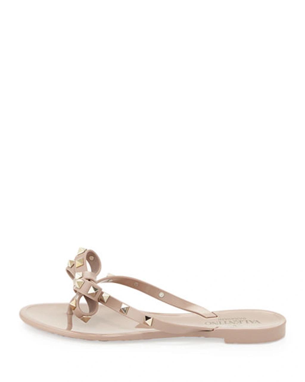 VALENTINO GARAVANI Women Rockstud Rubber Flip Flops In Beige Product Image