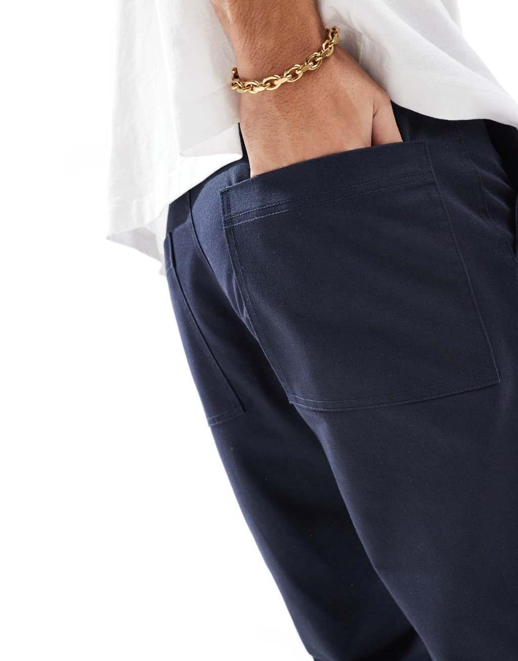 ASOS DESIGN tapered pants in navy Product Image