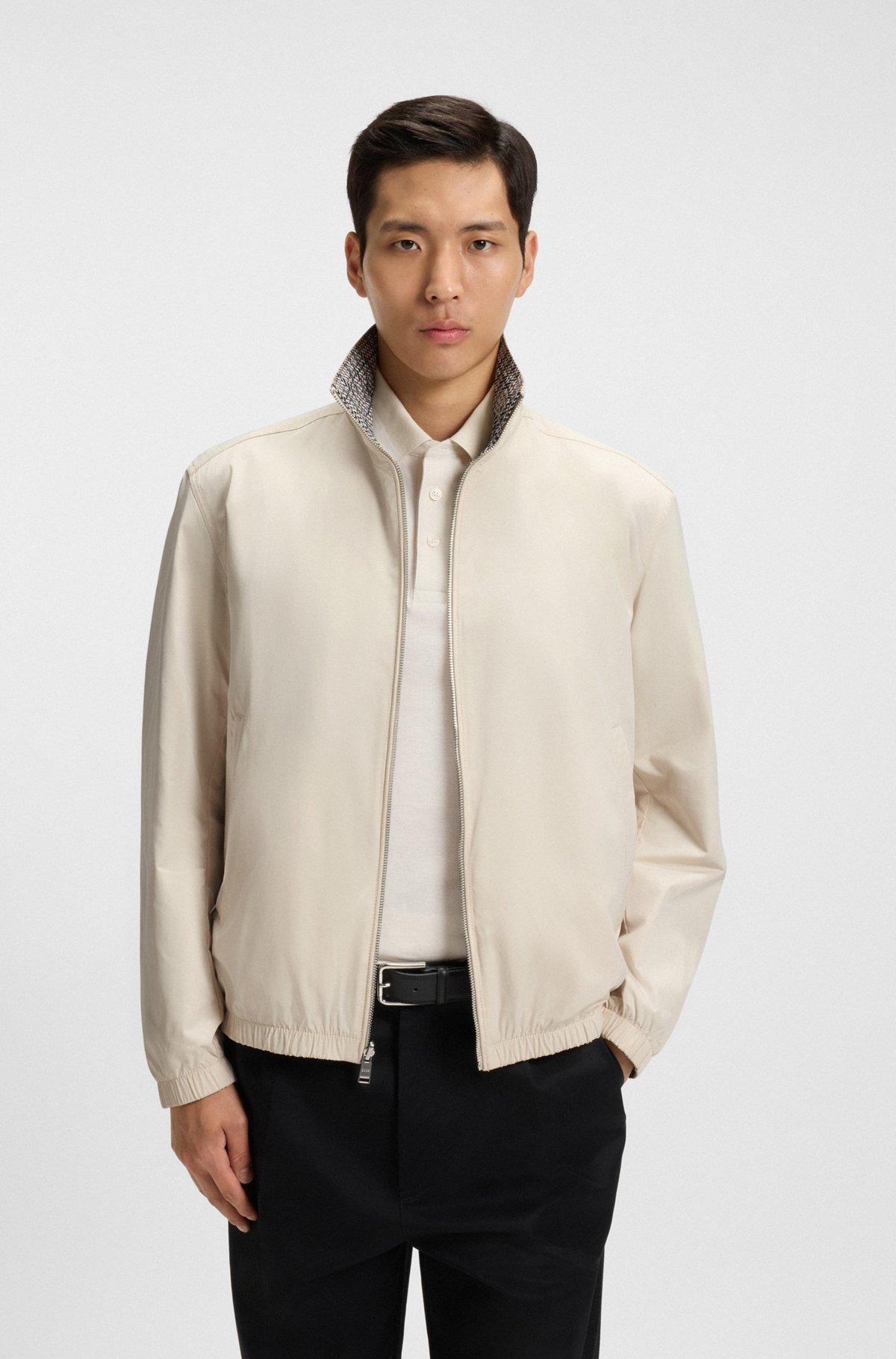 Water-repellent reversible jacket with check pattern Product Image