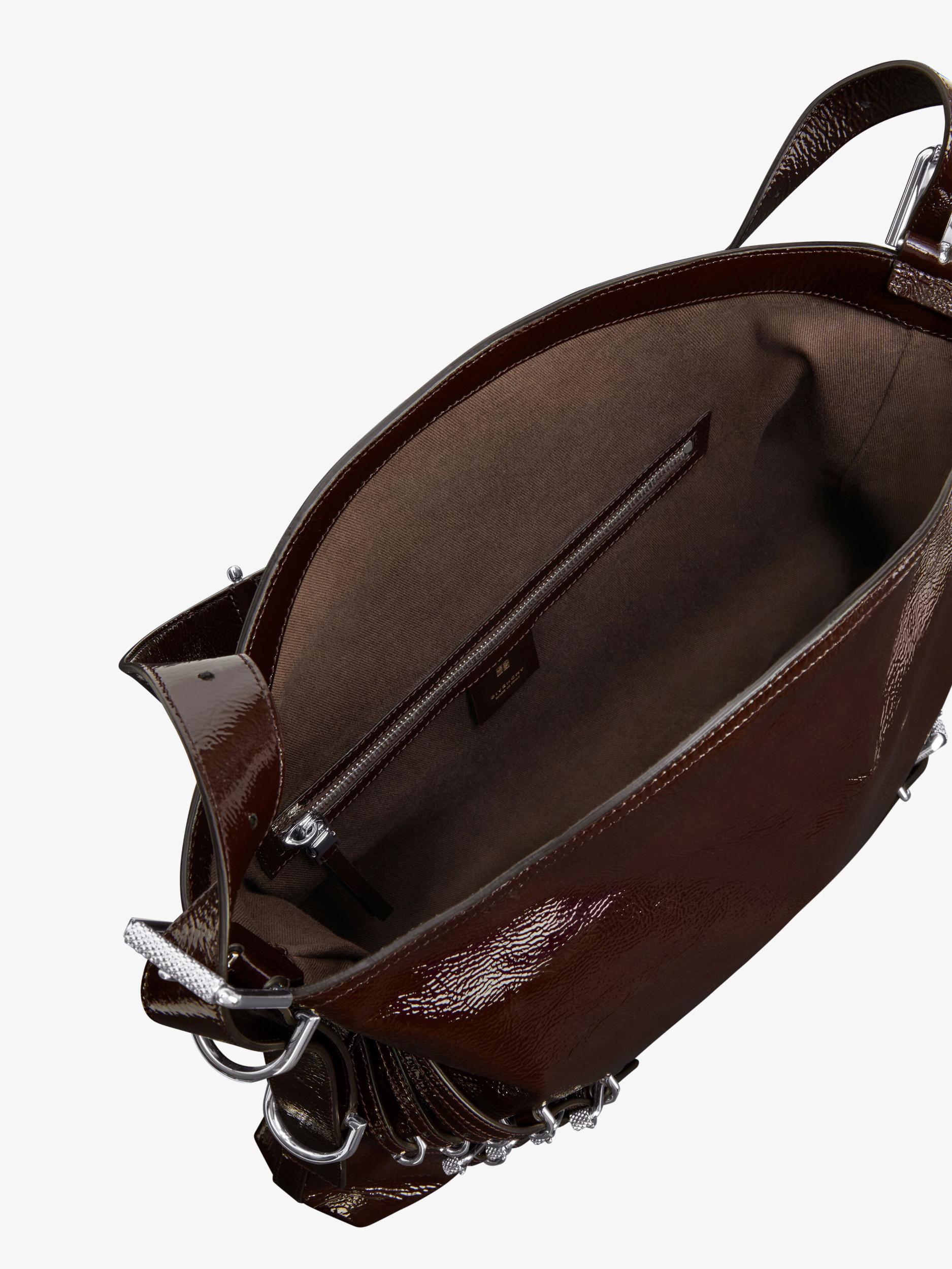 Medium Voyou bag in patent leather with multi-buckles Product Image