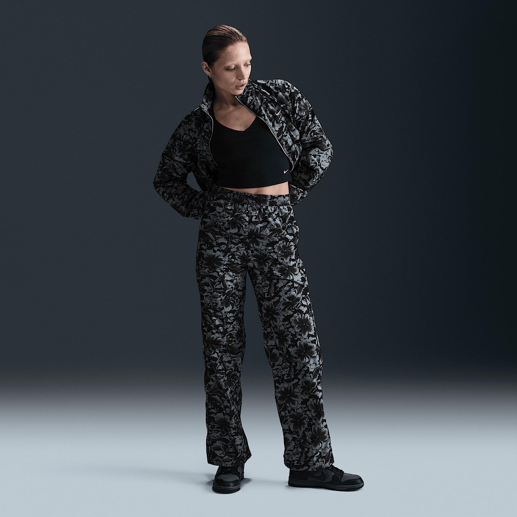 Nike Sportswear Windrunner Women's UV Protection Mid-Rise Woven Printed Pants Product Image