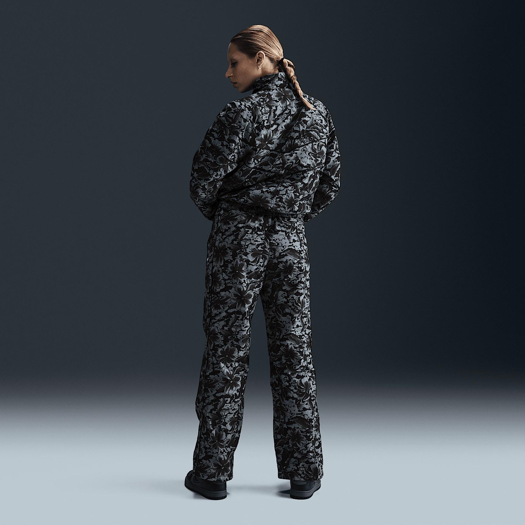 Nike Sportswear Windrunner Women's UV Protection Mid-Rise Woven Printed Pants Product Image