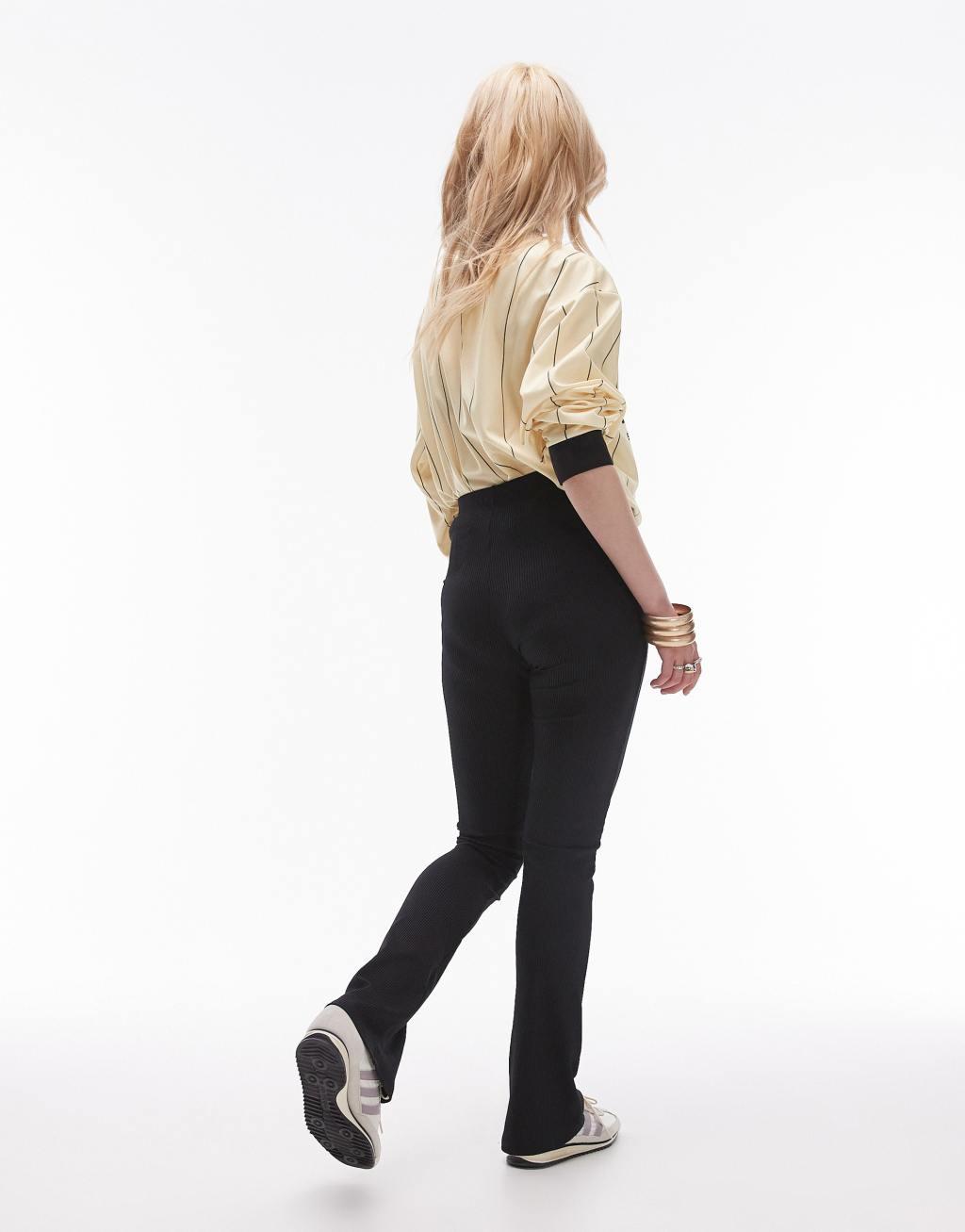 Topshop Petite skinny ribbed flared pants in black Product Image