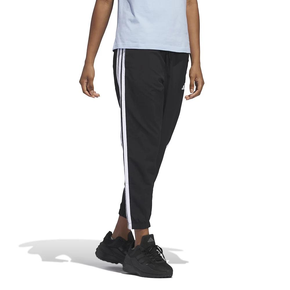 Women's adidas Essentials 3-Stripes Woven 7/8 Sportswear Pants, Size: XL, Black Product Image