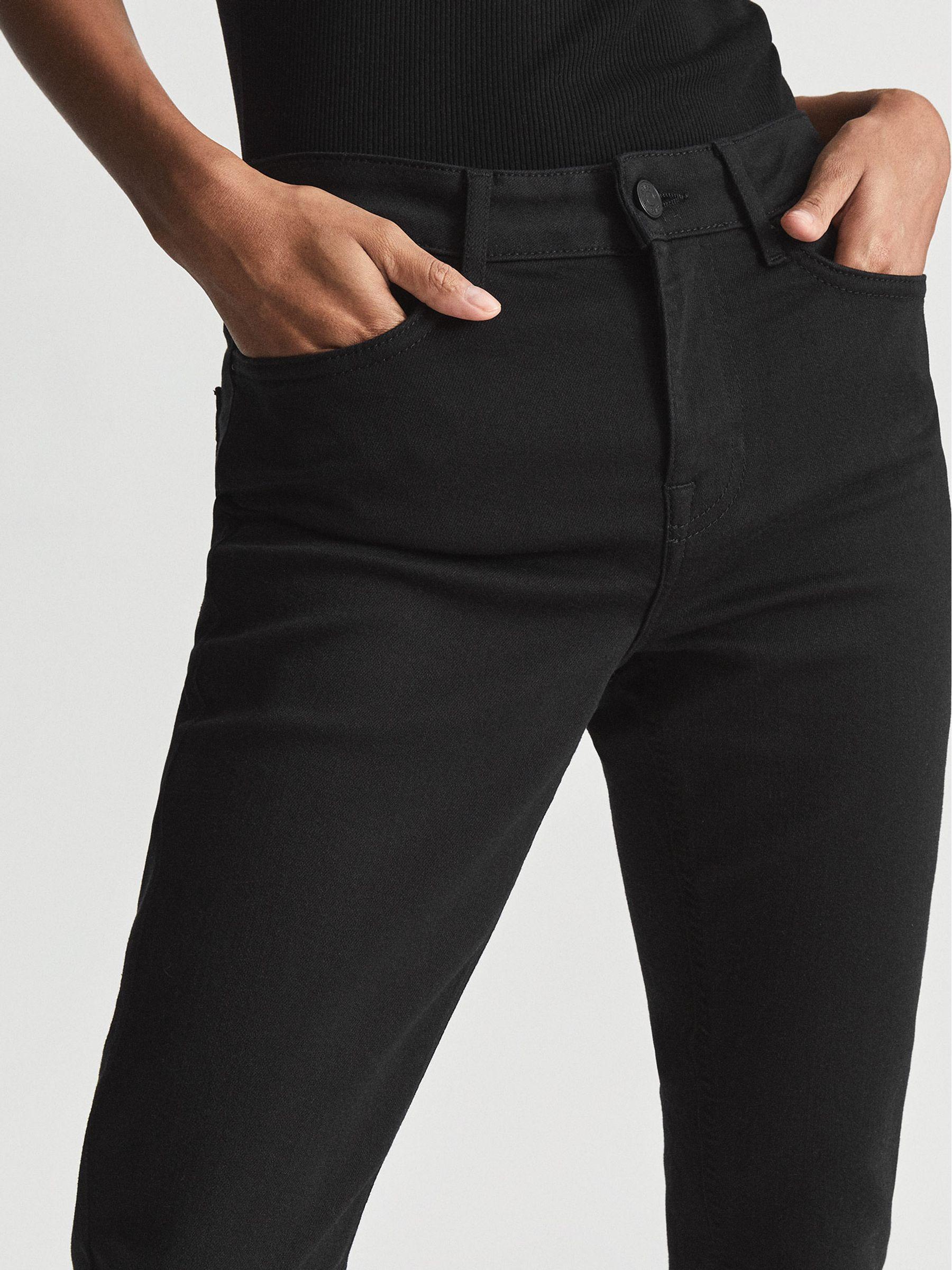 Mid Rise Skinny Jeans in Black Product Image