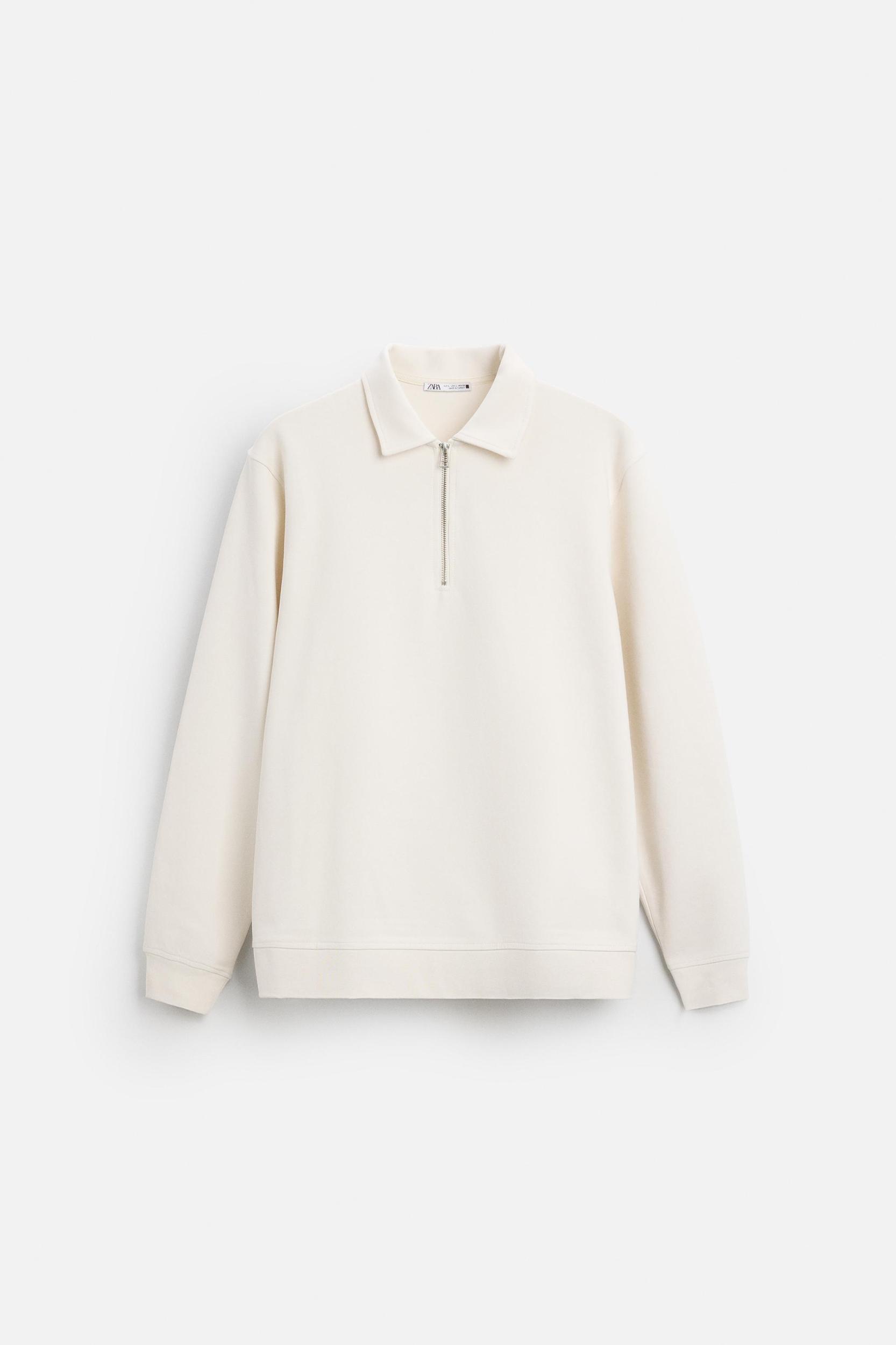 INTERLOCK POLO QUARTER-ZIP SWEATSHIRT Product Image