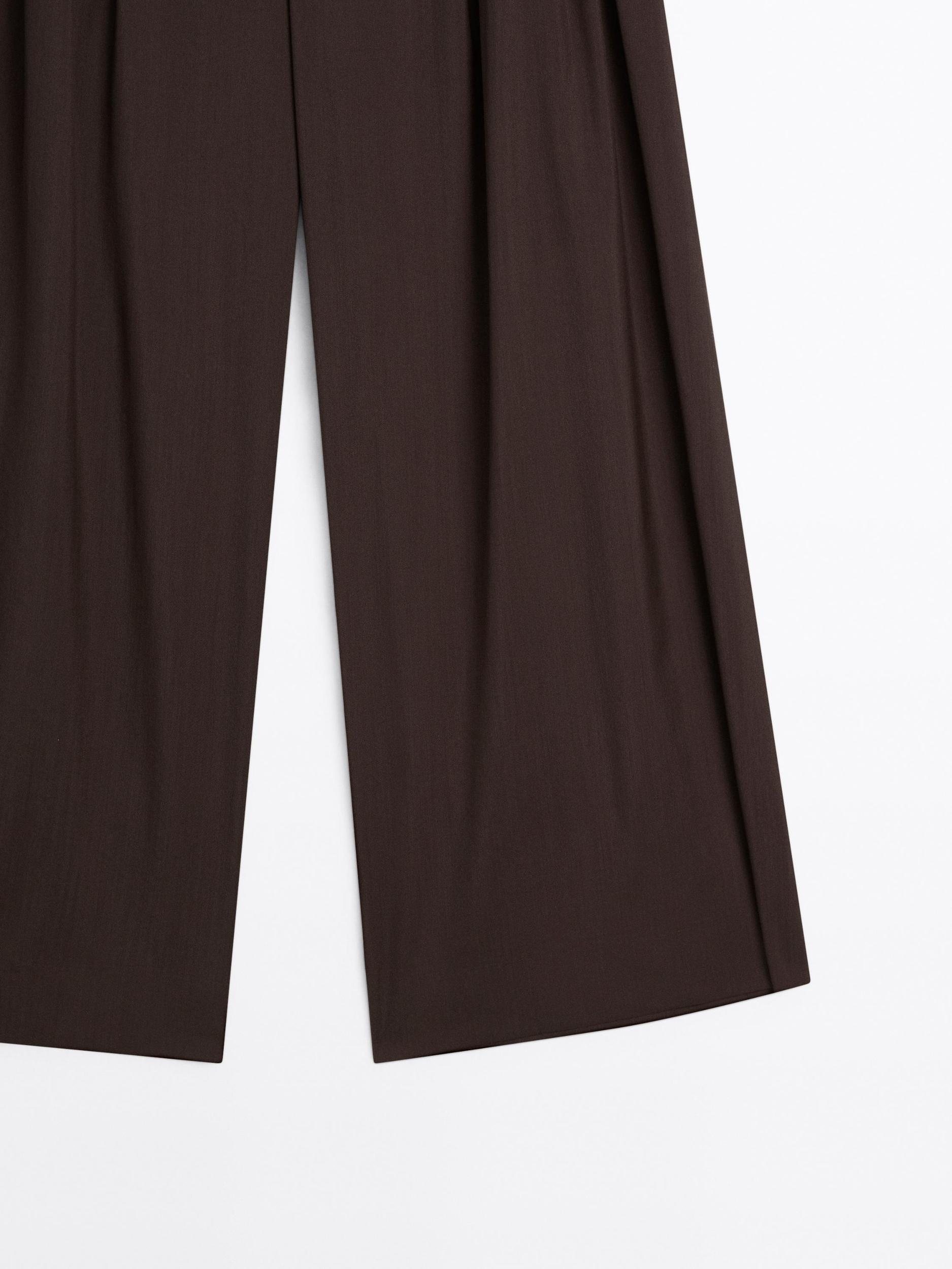 Flowing trousers with darts Product Image