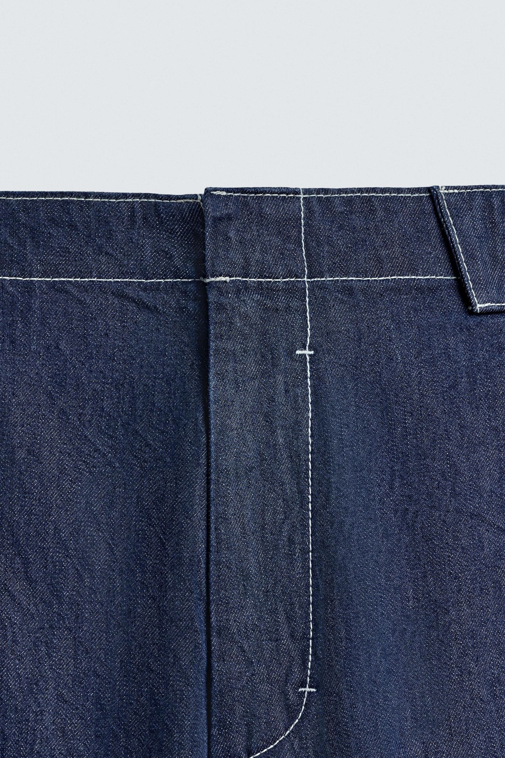 EMBROIDERED BAND DETAIL JEANS Product Image