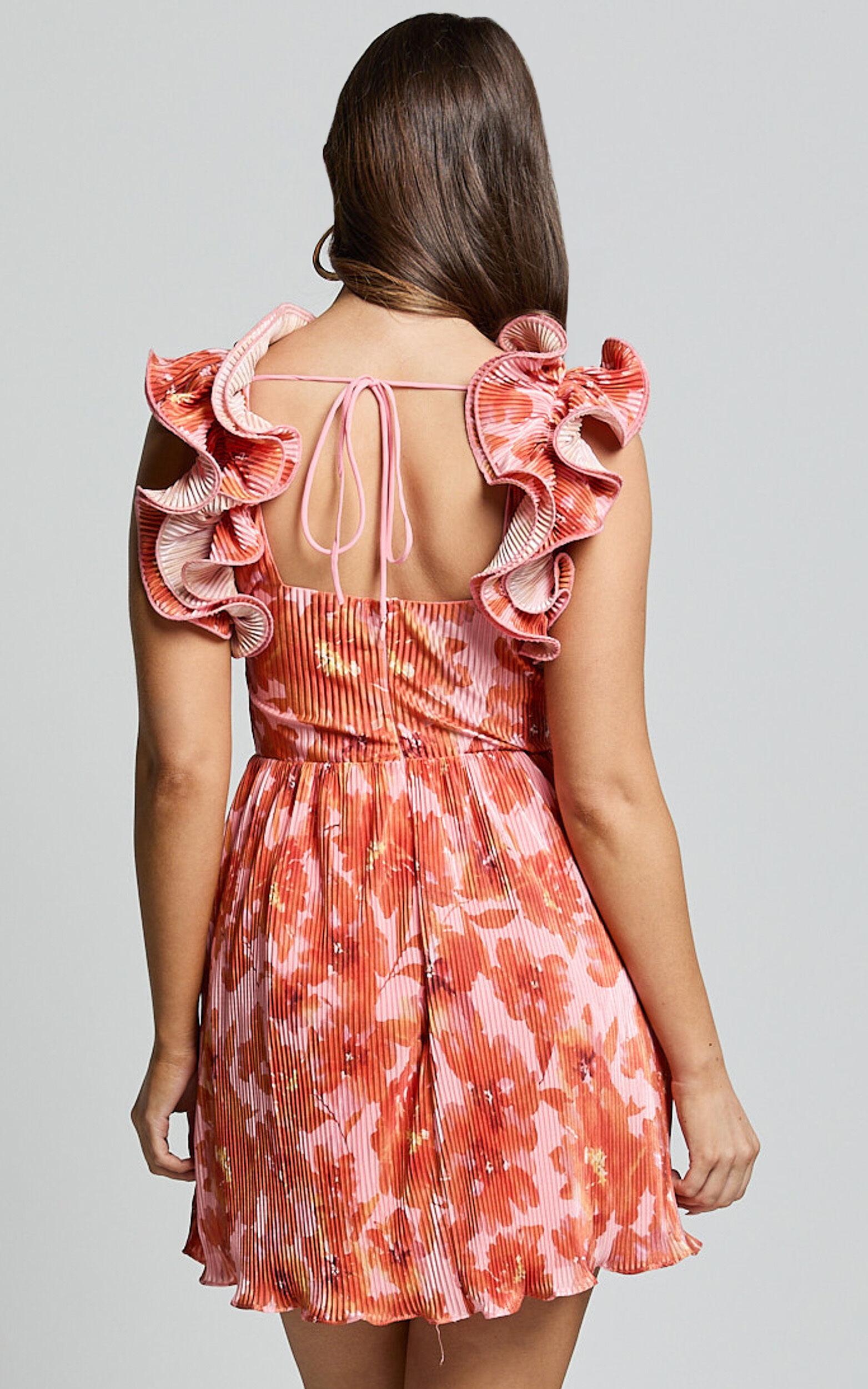 Carol Mini Dress - Pleated Fabric With Ruffle Trims Dress in Orange Floral Print Product Image