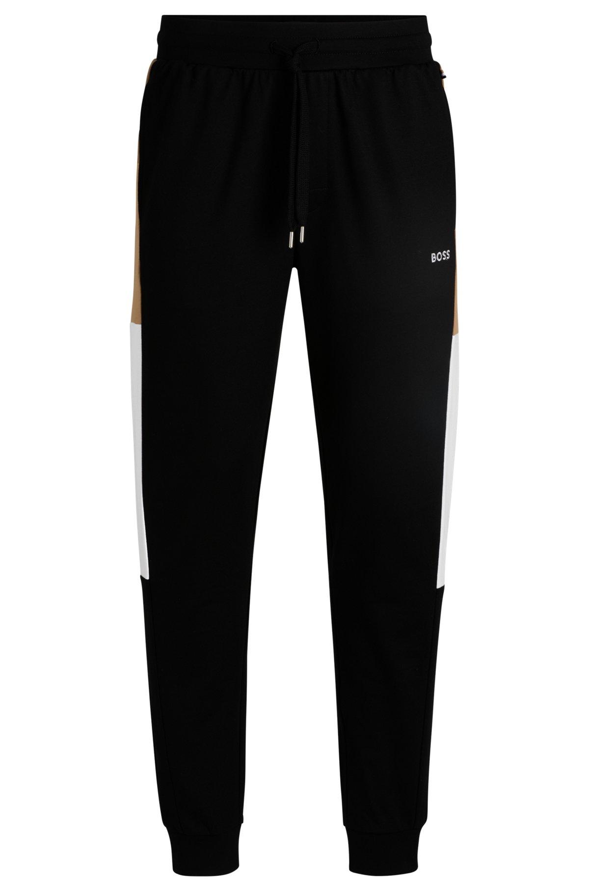 Cotton-terry tracksuit bottoms with contrast side panels Product Image