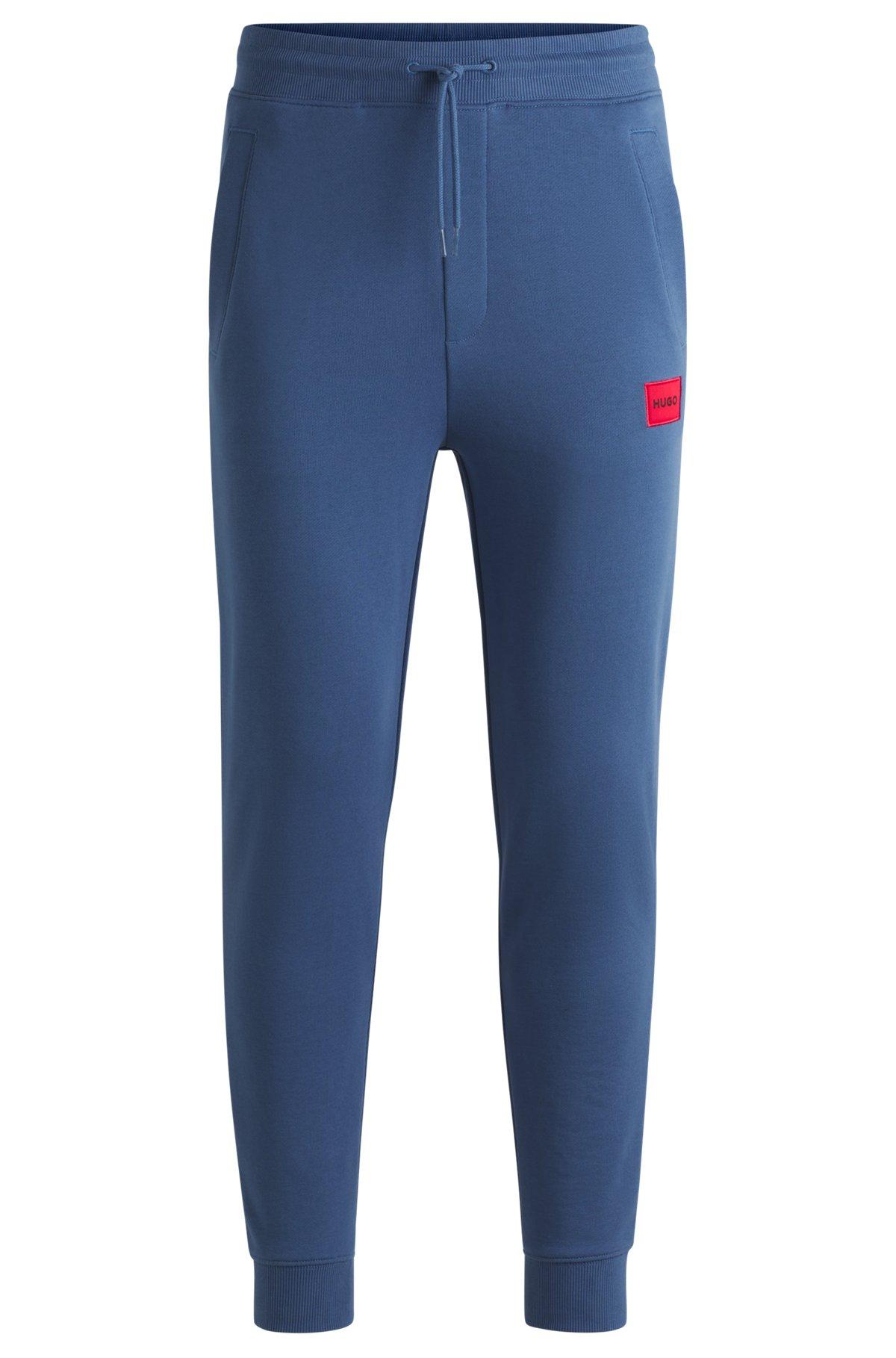 Logo-label tracksuit bottoms in cotton terry Product Image