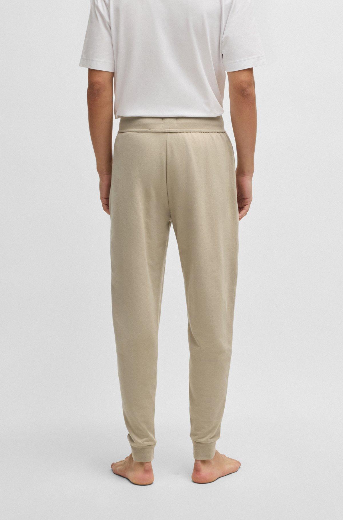 Drawcord tracksuit bottoms in cotton terry with logo print Product Image