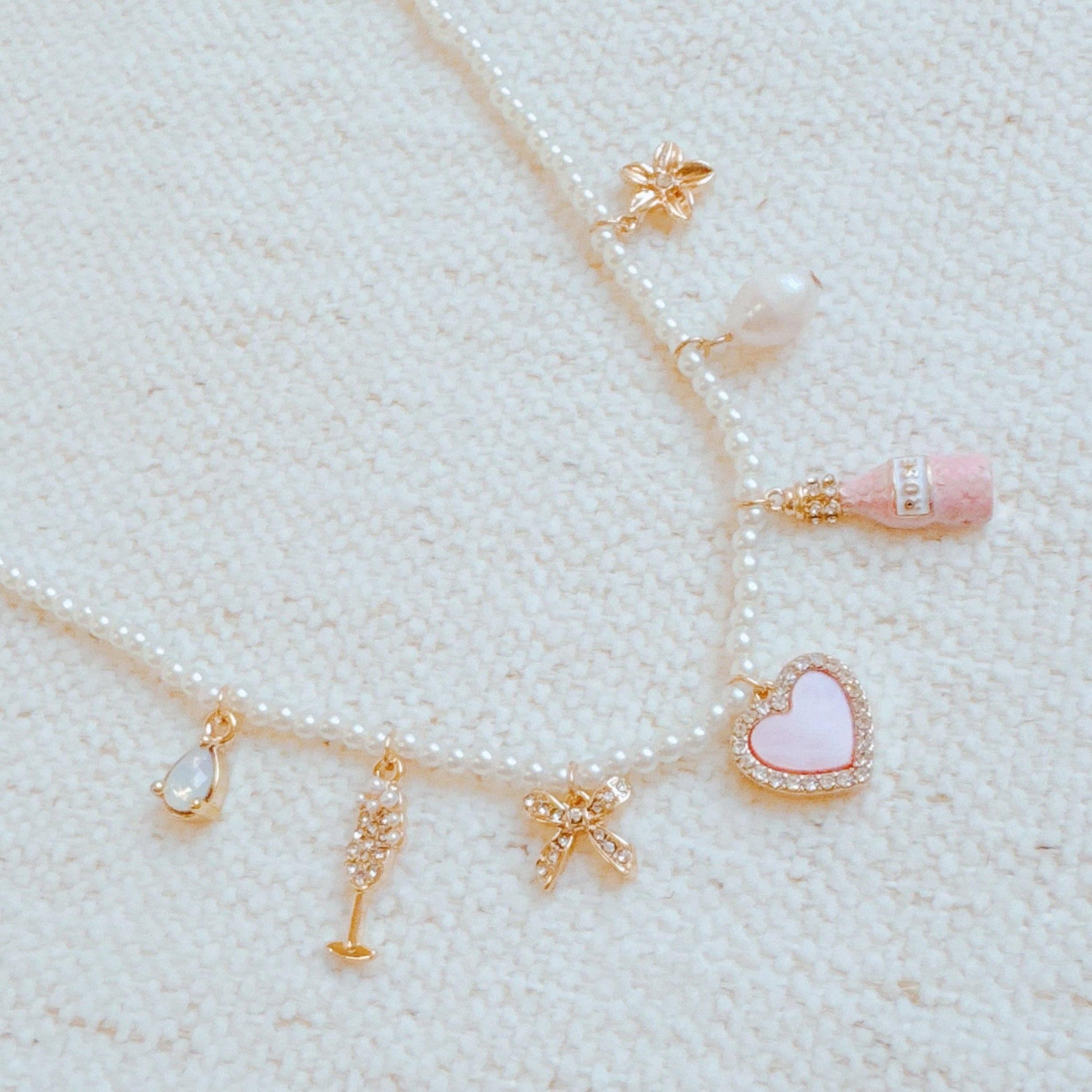 Pink Wink Celebration Multi Charm Necklace Product Image