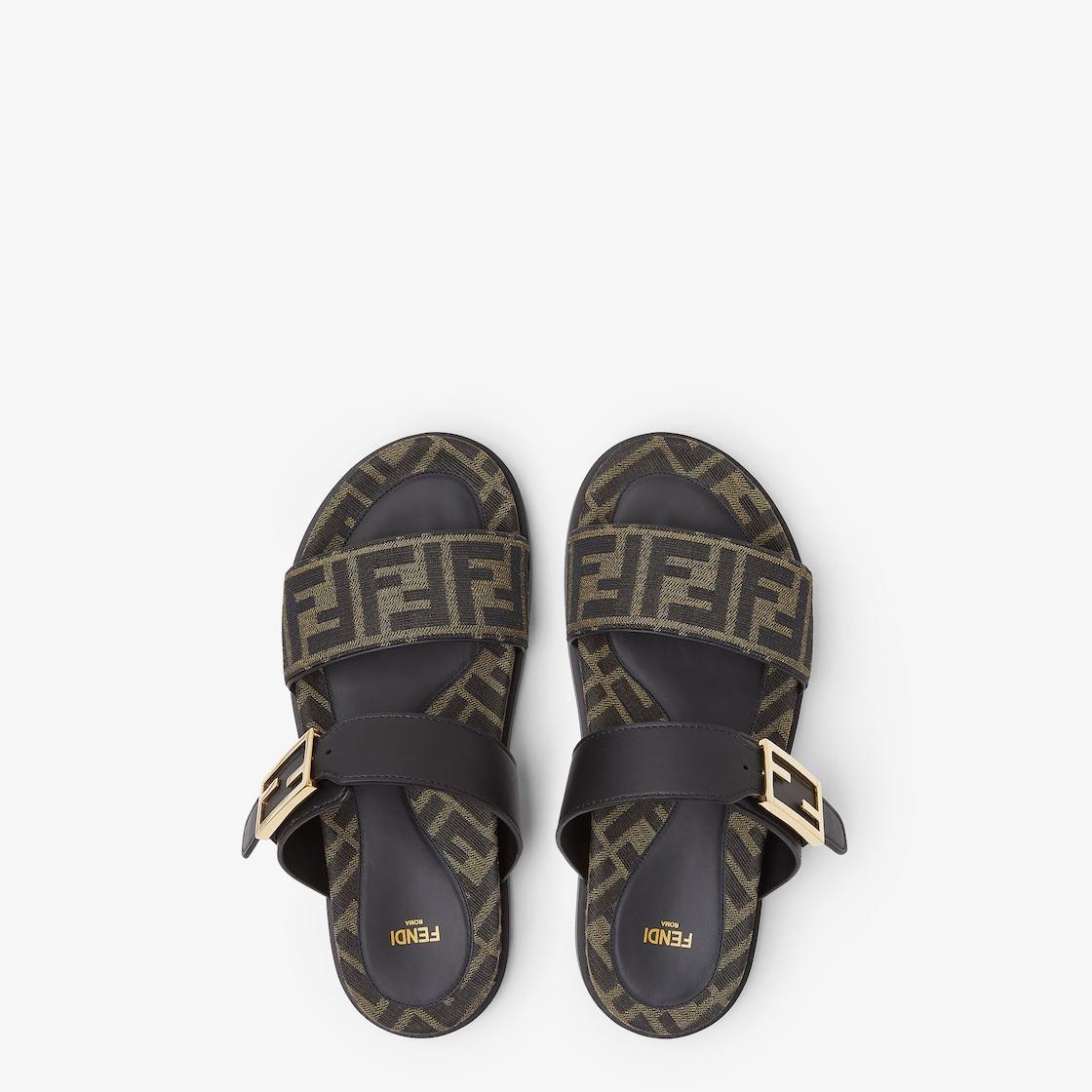 Fendi FeelBlack leather and brown FF fabric slides Product Image