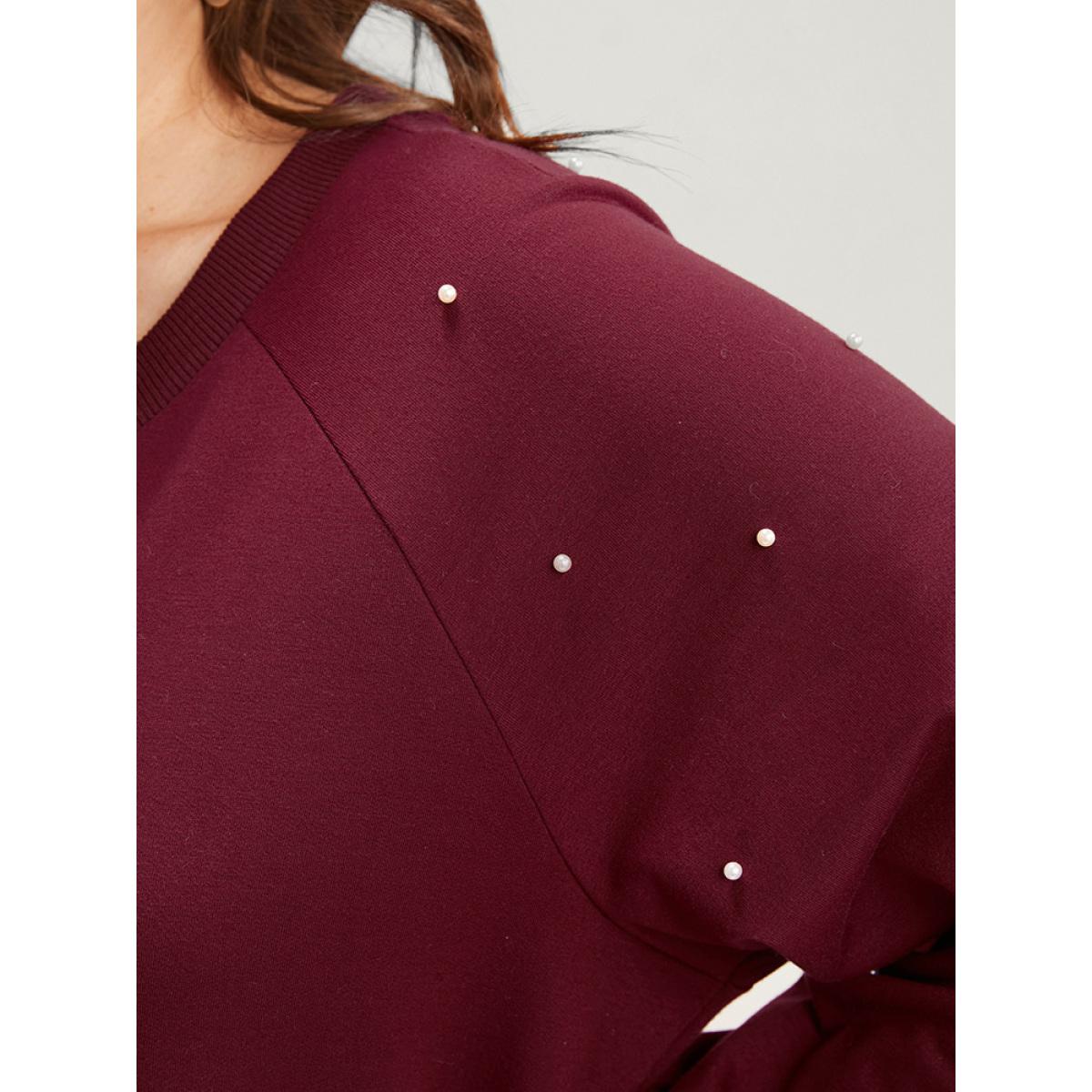 Plus Size Solid Pearls Beaded Raglan Sleeve Drop Shoulder Sweatshirt Women Scarlet Elegant Beaded Round Neck Dailywear Sweatshirts BloomChic 30/6X Product Image