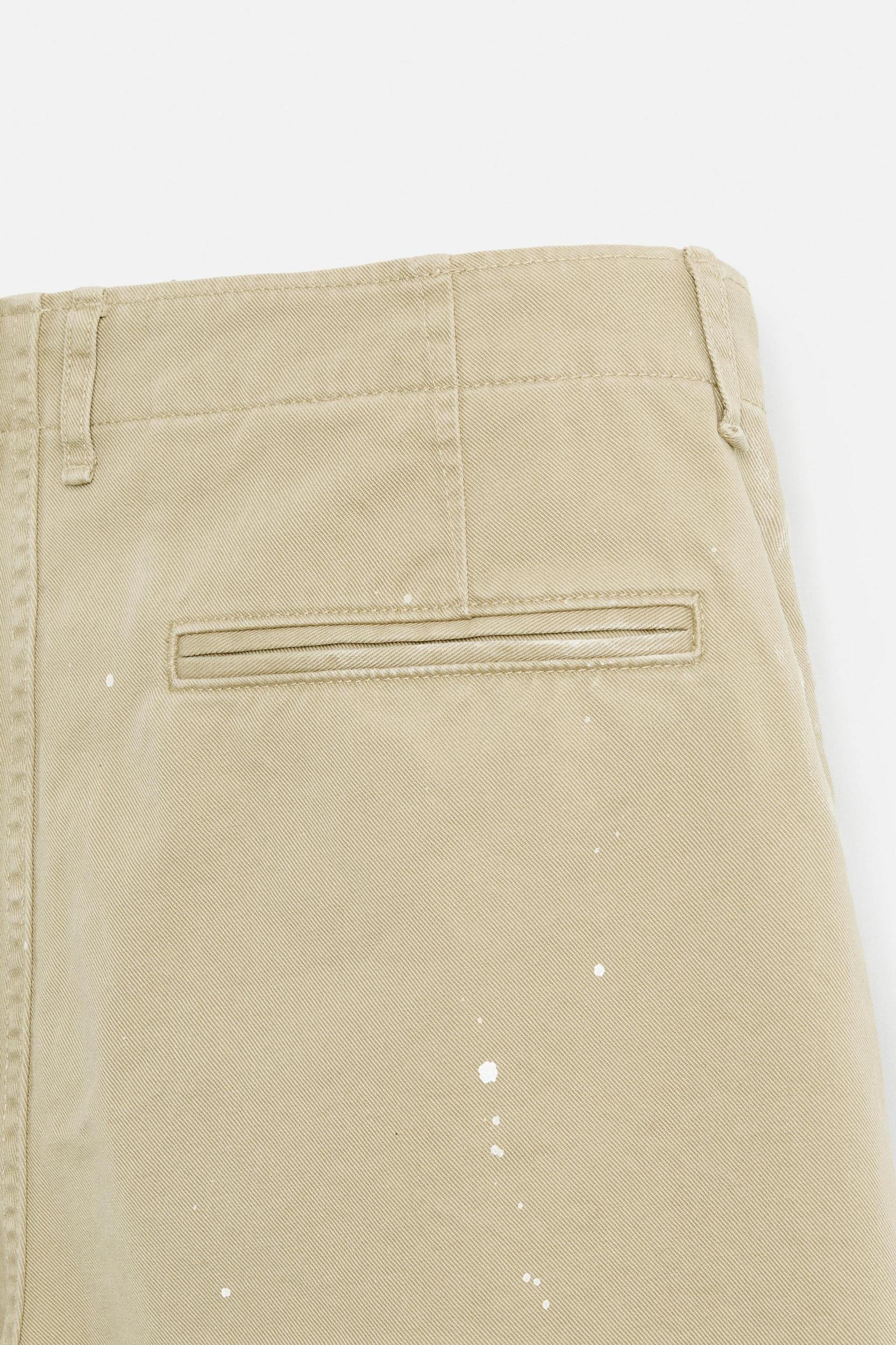 PAINT SPLATTER CHINO PANTS Product Image