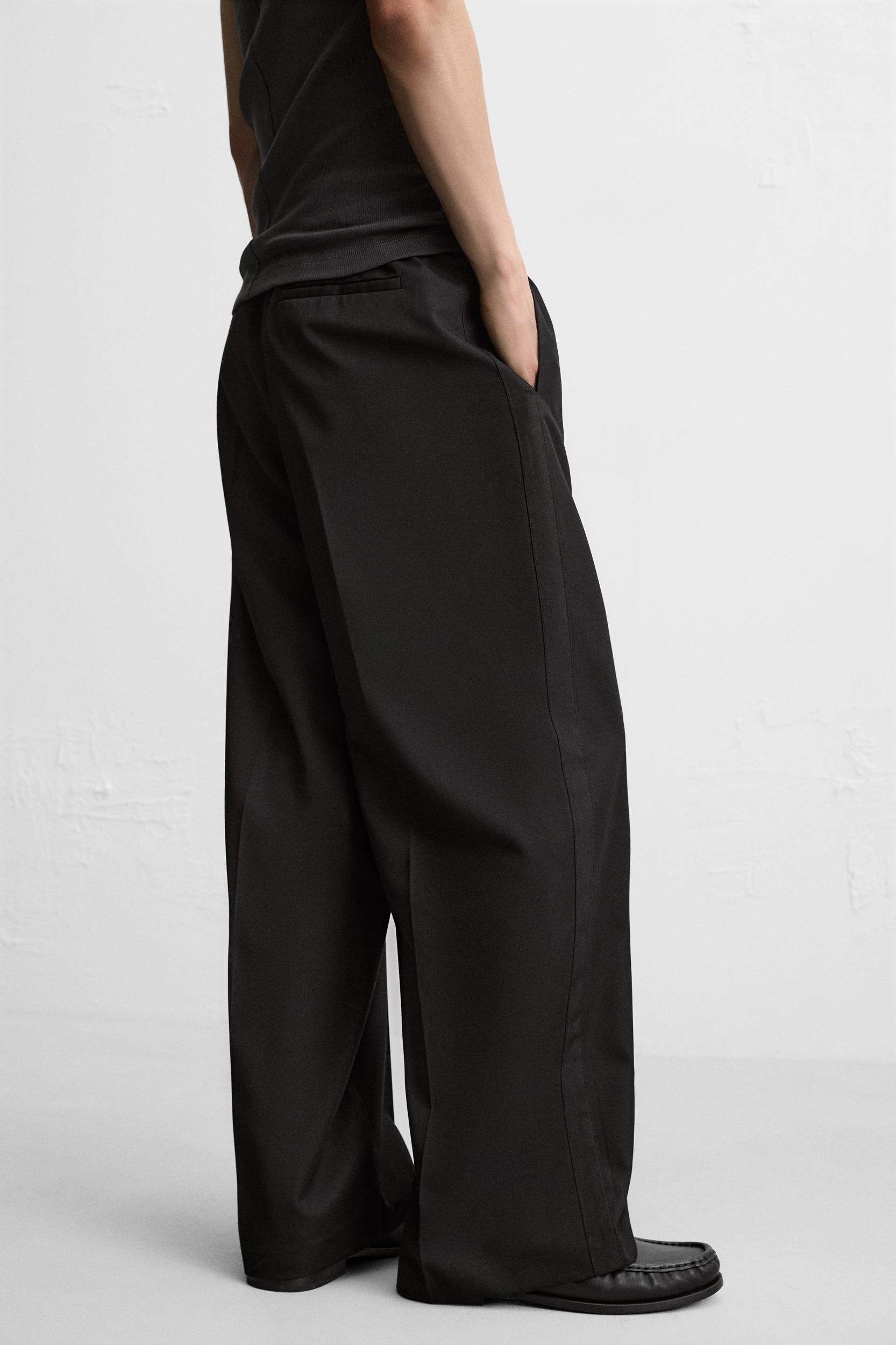 RELAXED FIT PANTS WITH STRIPE Product Image