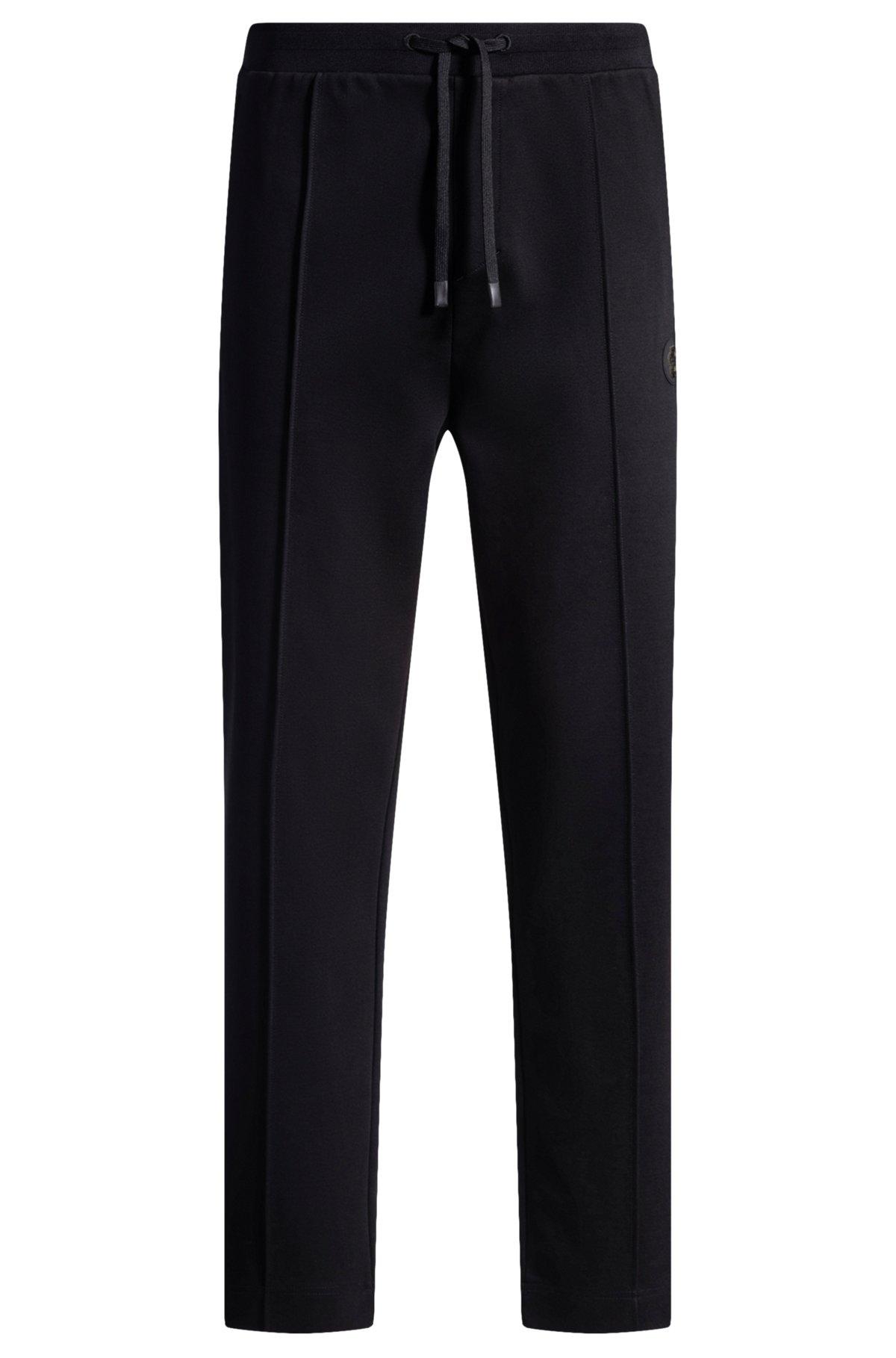 BOSS - Cotton tracksuit bottoms with Double B monogram - Black Product Image