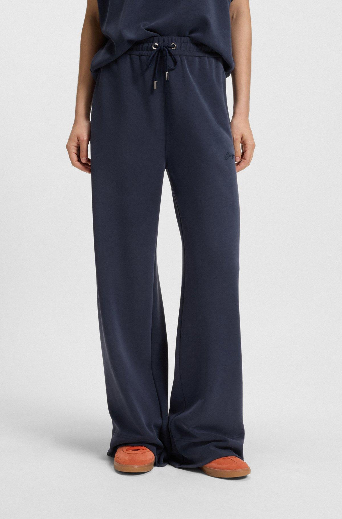 BOSS - Relaxed-fit tracksuit bottoms with embroidered logo - Dark Blue Product Image