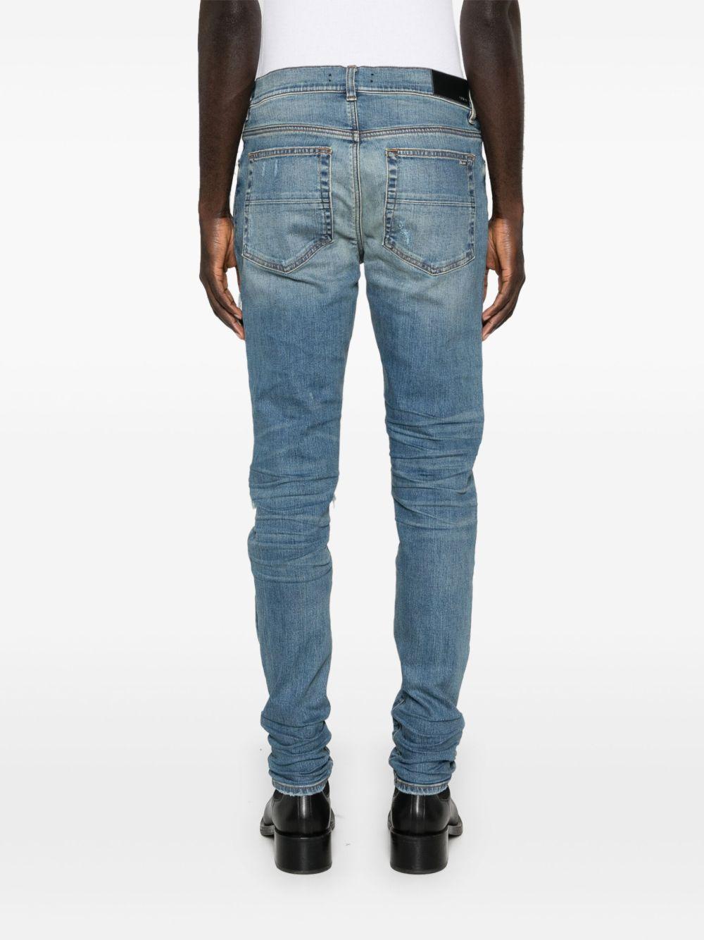 MX1 distressed-effect skinny jeans Product Image