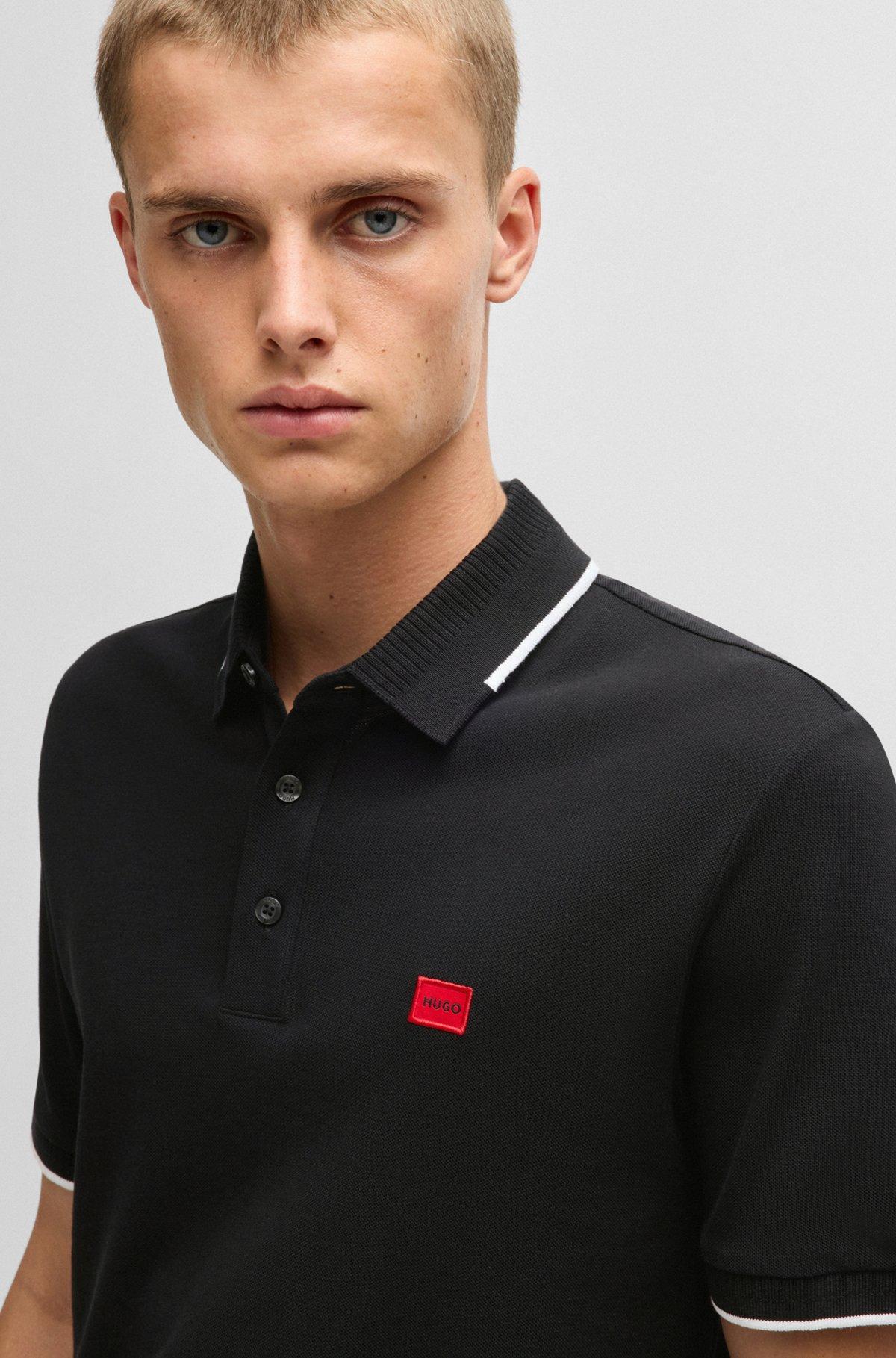 Slim-fit polo shirt with red logo label Product Image