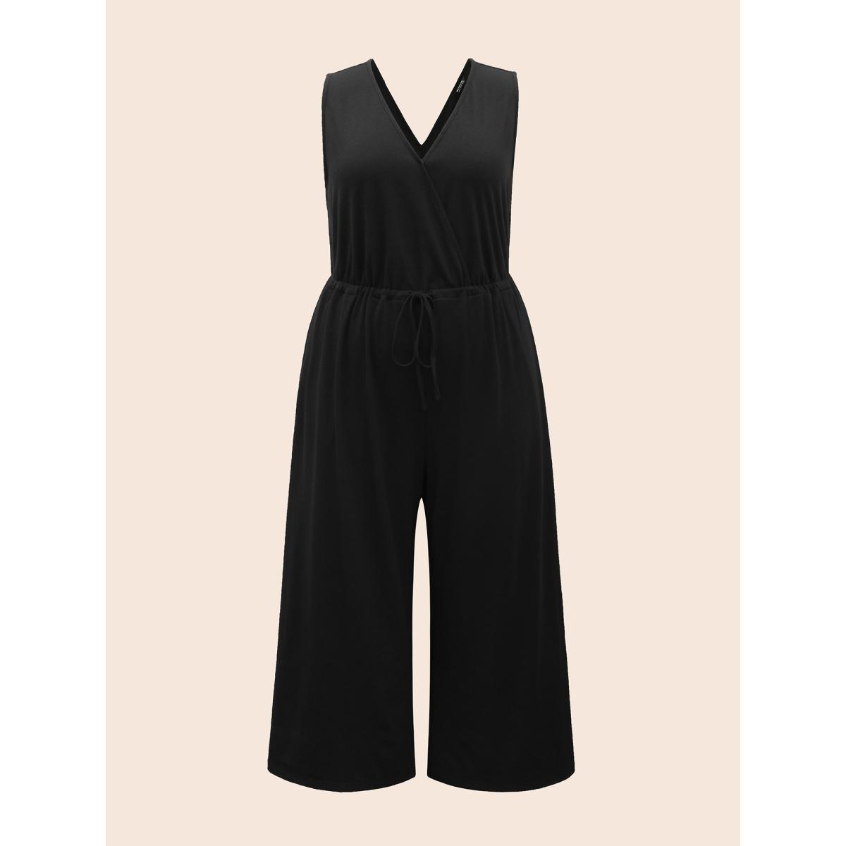 Plus Size Black Solid Overlap Collar Drawstring Jumpsuit Women Elegant Sleeveless Overlap Collar Everyday Loose Jumpsuits BloomChic 14-16/1X Product Image