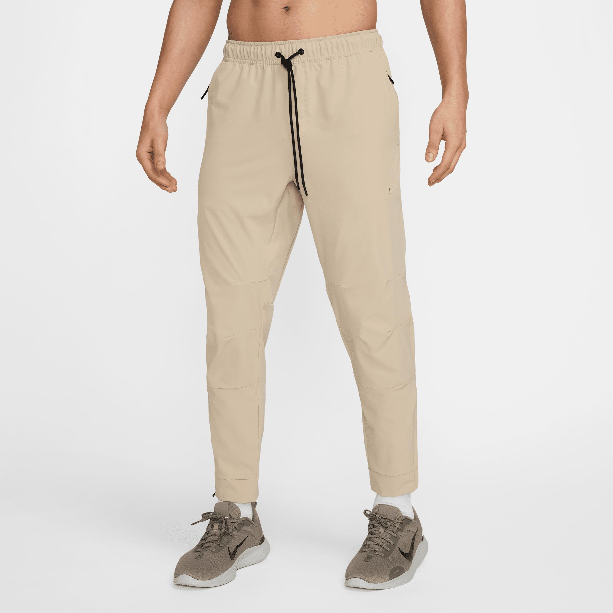 Nike Mens Unlimited Dri-FIT Zippered Cuff Versatile Pants | FB7548-320 Product Image