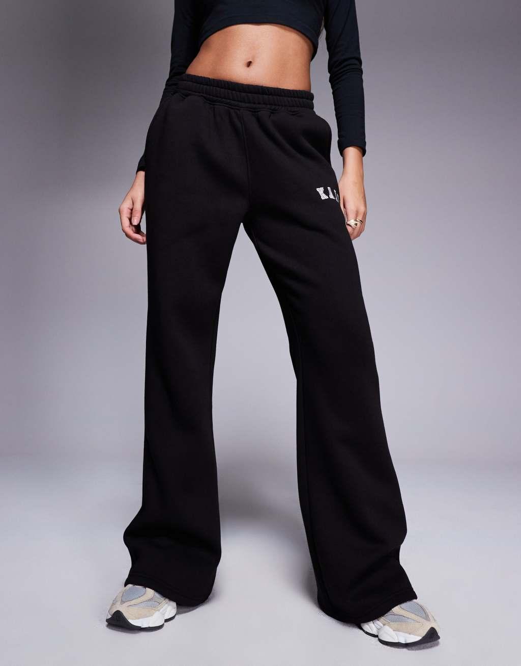 Kaiia Petite embroidered logo wide leg sweatpants in black Product Image