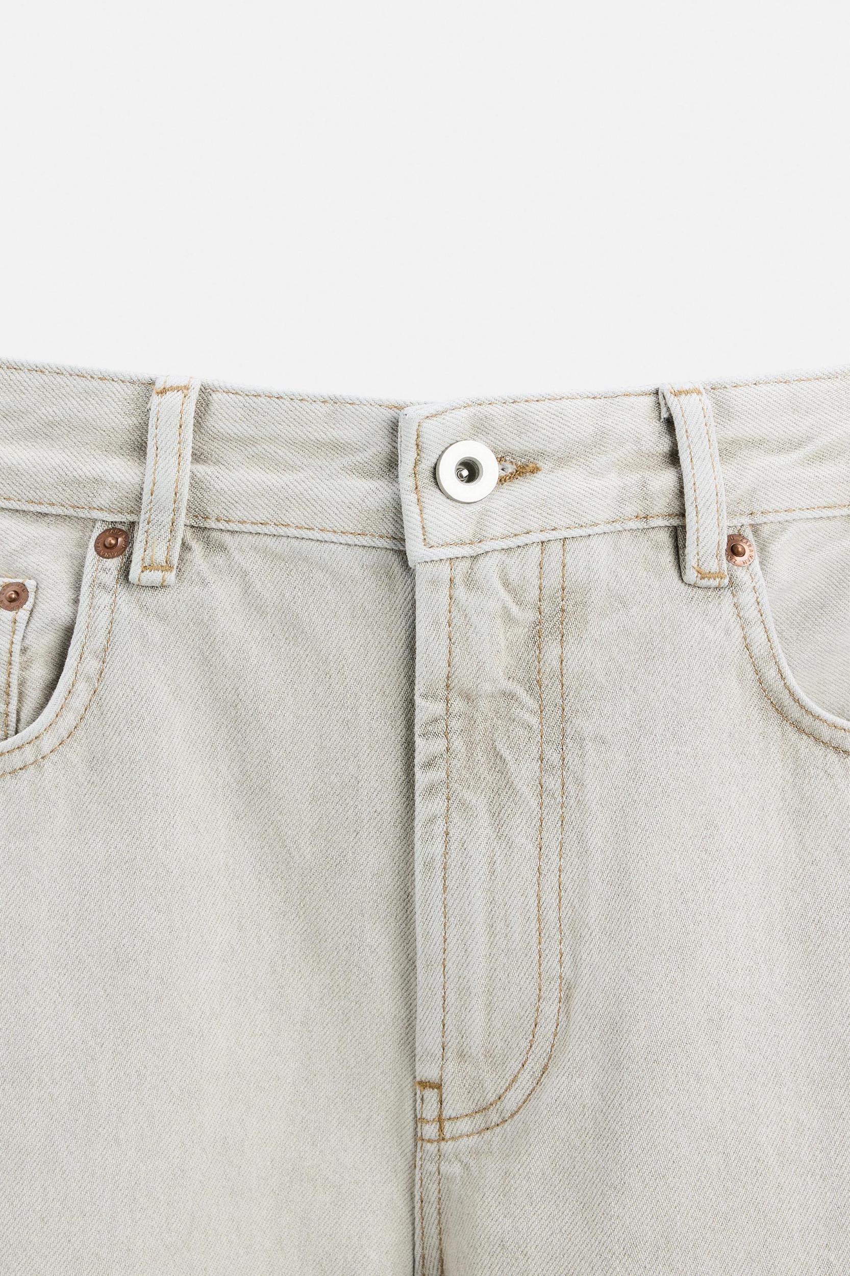 ASYMMETRIC SEAM BAGGY FIT JEANS Product Image