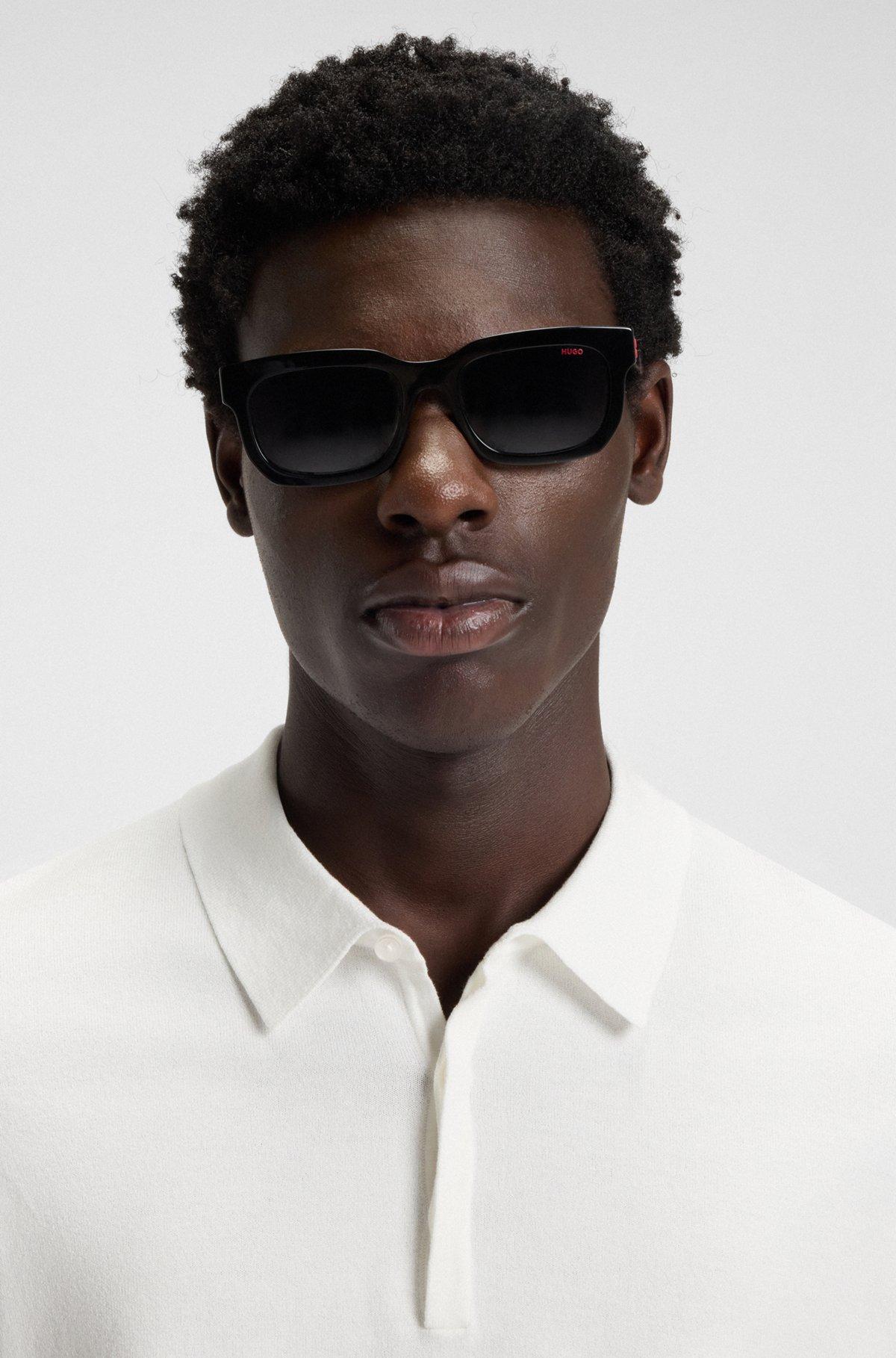 Slim-fit knit polo with rear logo Product Image