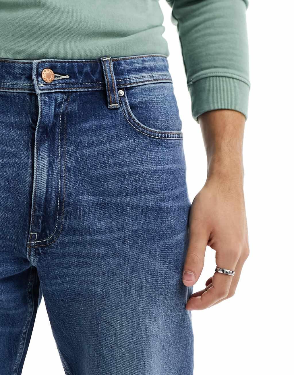 ASOS DESIGN straight leg jeans with stretch in mid wash blue Product Image