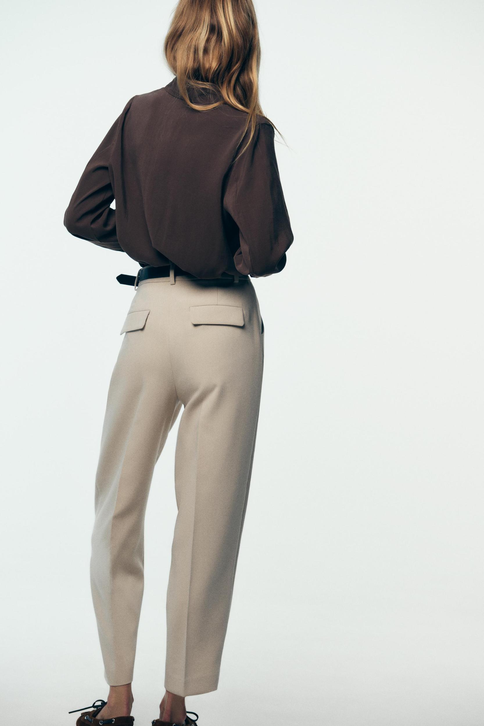 BELTED PLEATED PANTS Product Image