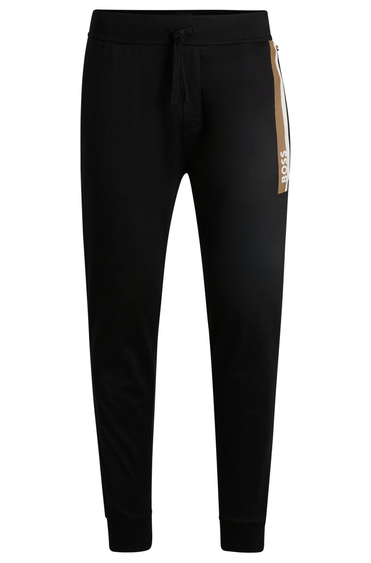 Cotton-terry tracksuit bottoms with stripe print Product Image