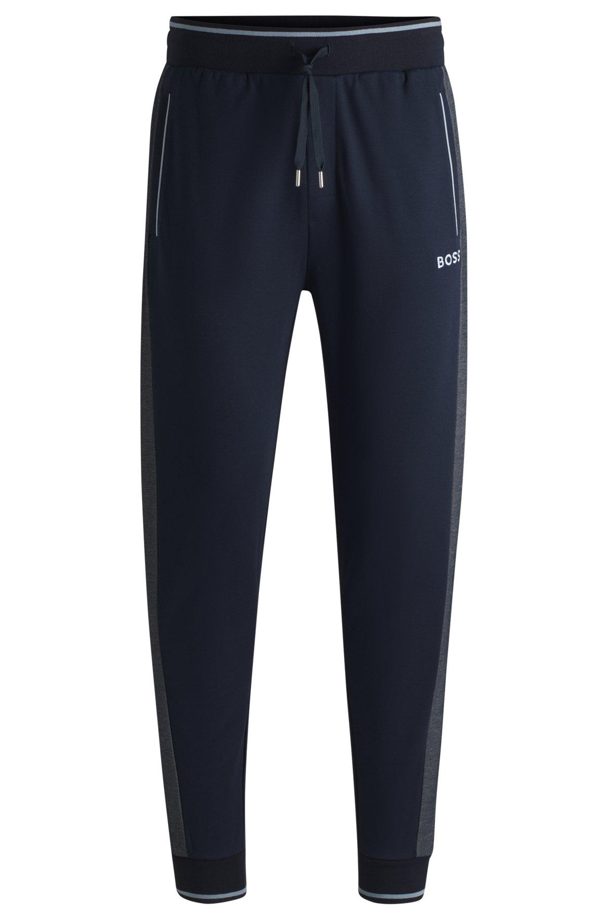 Tracksuit bottoms with contrast piping Product Image