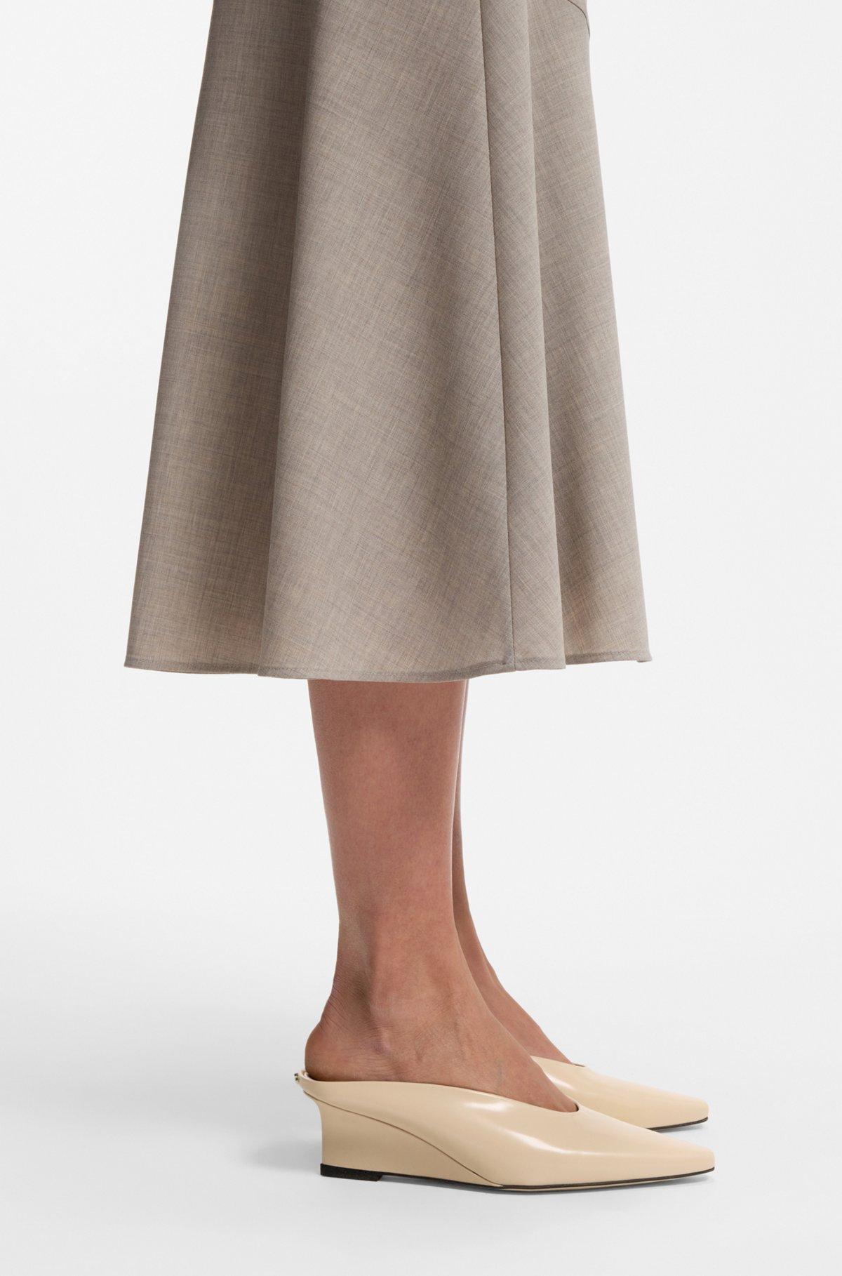 Wedge-heel mules in leather Product Image