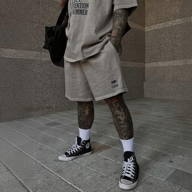 Elbow-Sleeve Crew Neck Lettering Print T-Shirt / Drawstring Waist Wide Leg Sweat Shorts Product Image