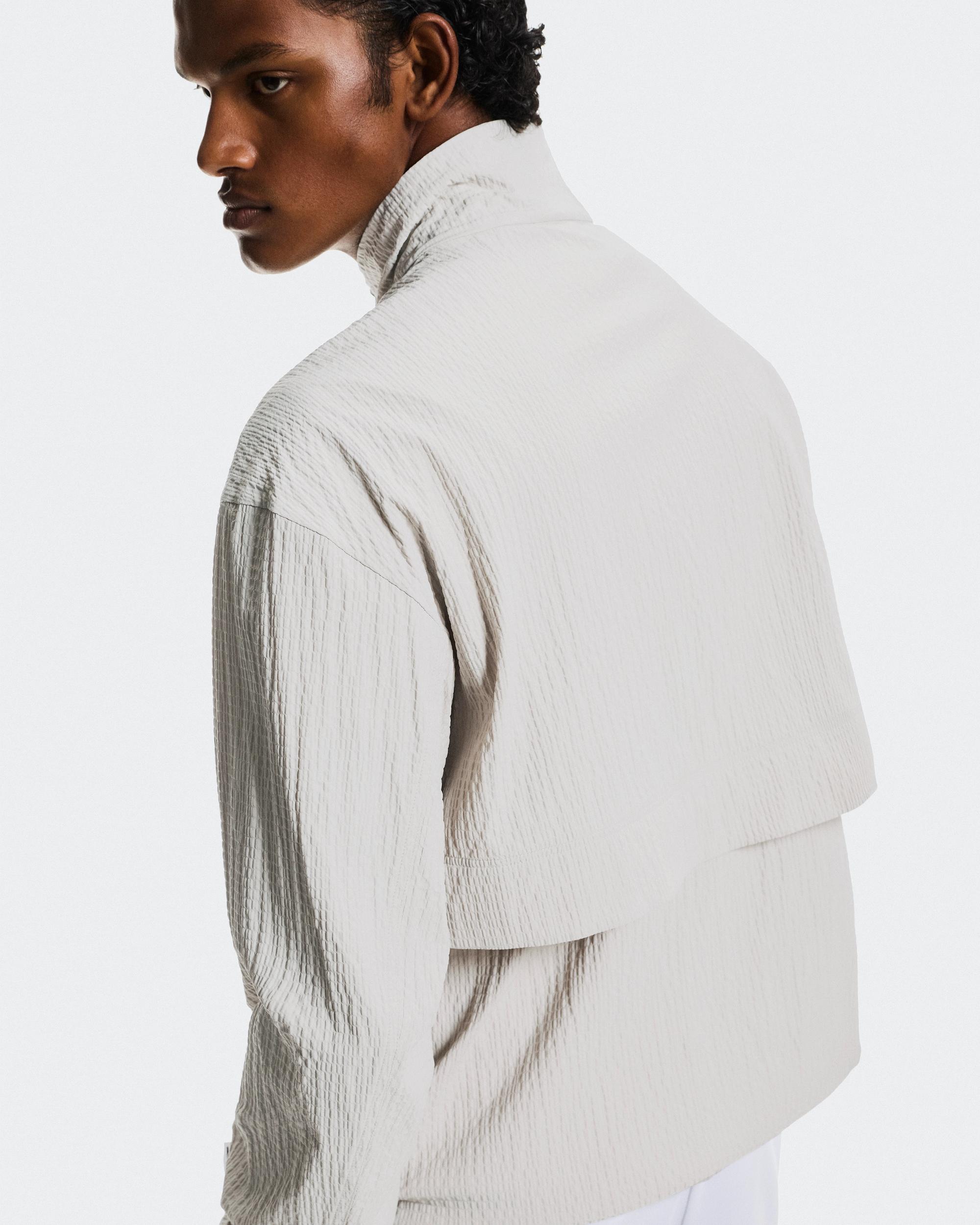 Courtside 1/2 Zip Eaze: Men's Lightweight Jacket Product Image