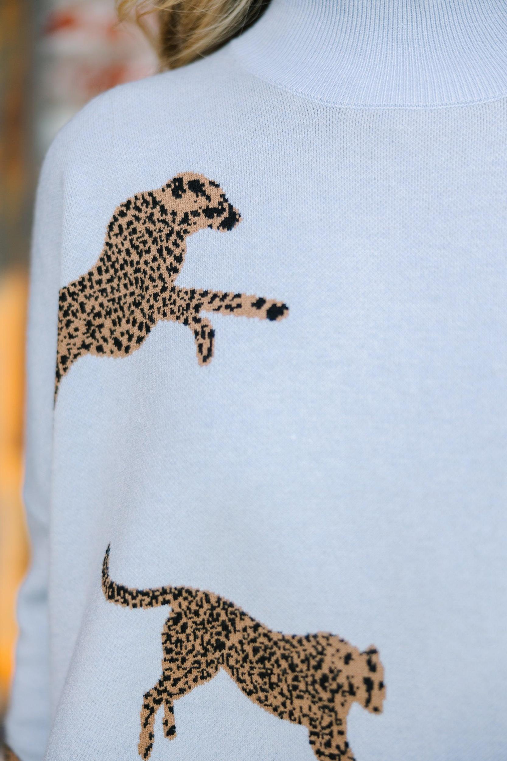 Quick Decisions Light Blue Cheetah Sweater Female Product Image