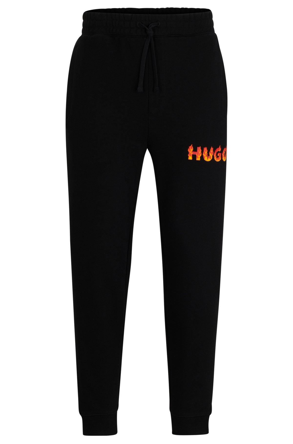 Cotton-terry tracksuit bottoms with puffed flame logo Product Image