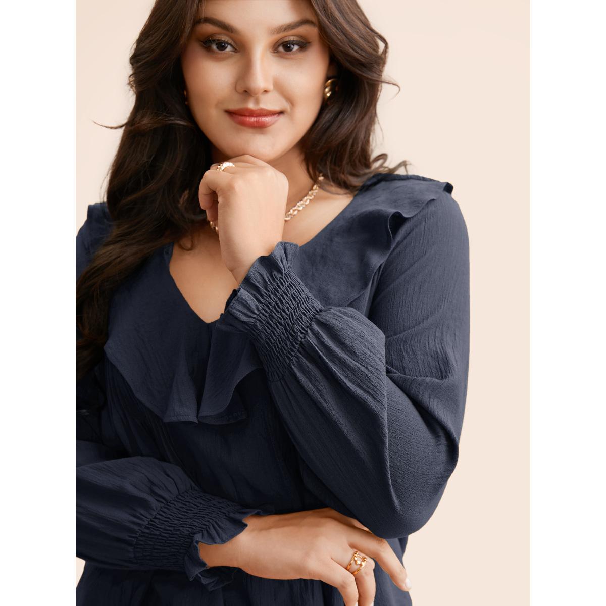 Plus Size Indigo Solid Texture Pleated Ruffle Trim Blouse Women Elegant Long Sleeve Deep V-neck Everyday Blouses BloomChic 28/5X Product Image