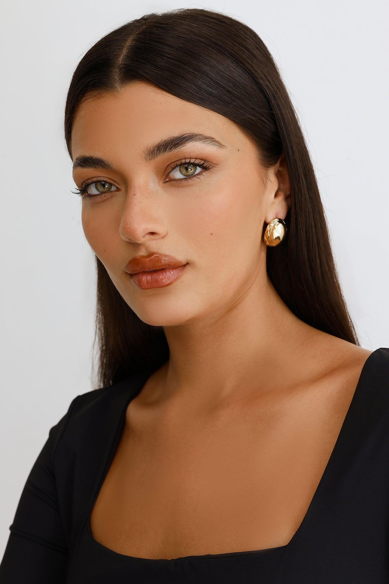 Glowing Earrings Gold Product Image