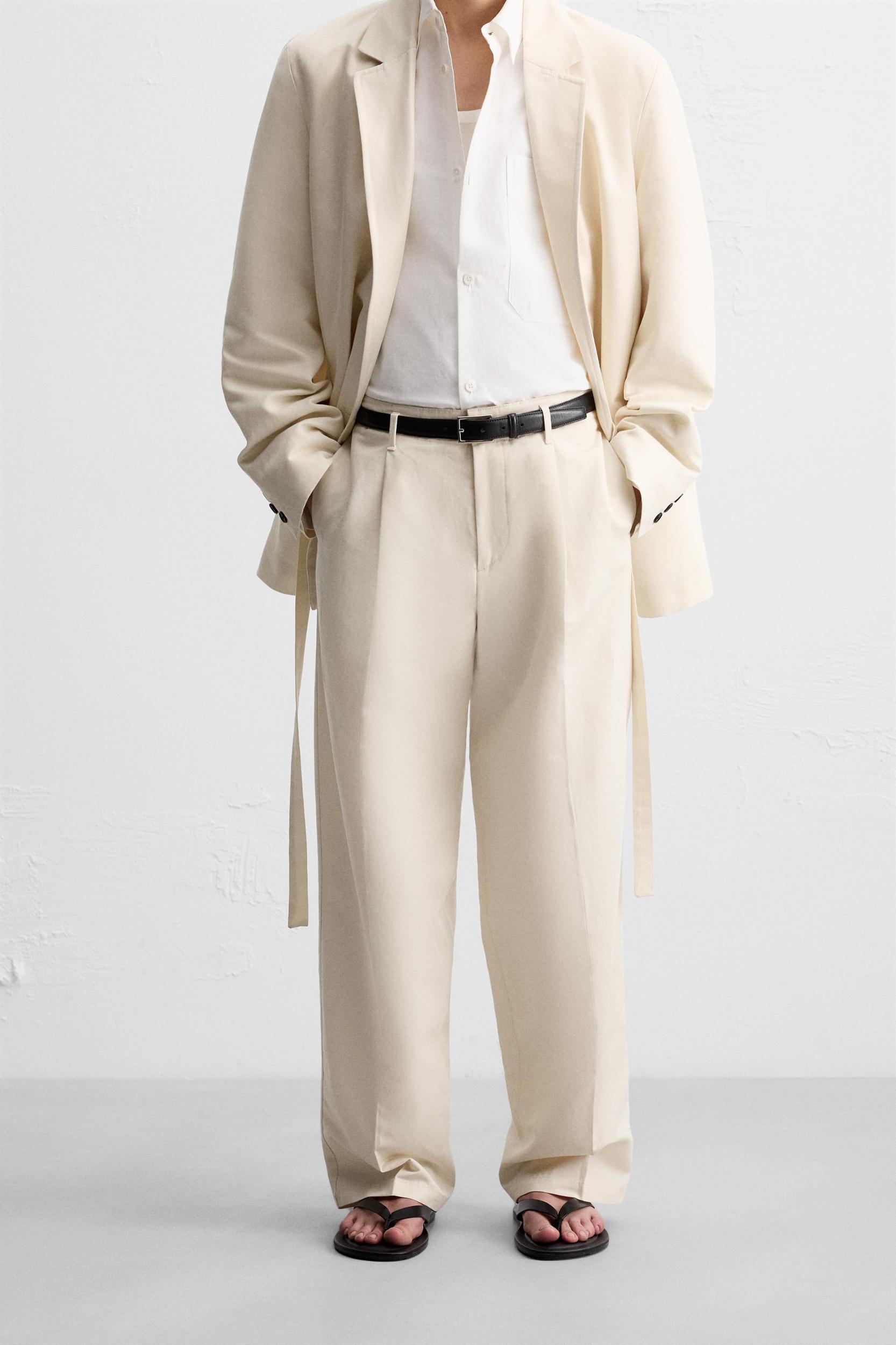 PLEATED SUIT PANTS Product Image