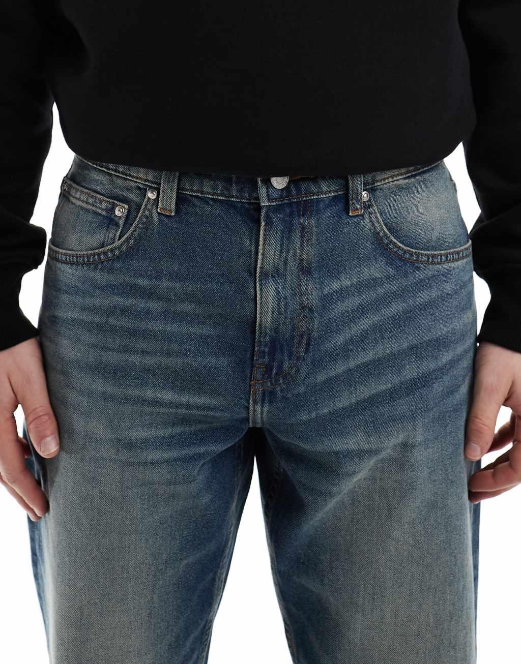 ASOS DESIGN tapered jeans with vintage tint in dark wash blue Product Image