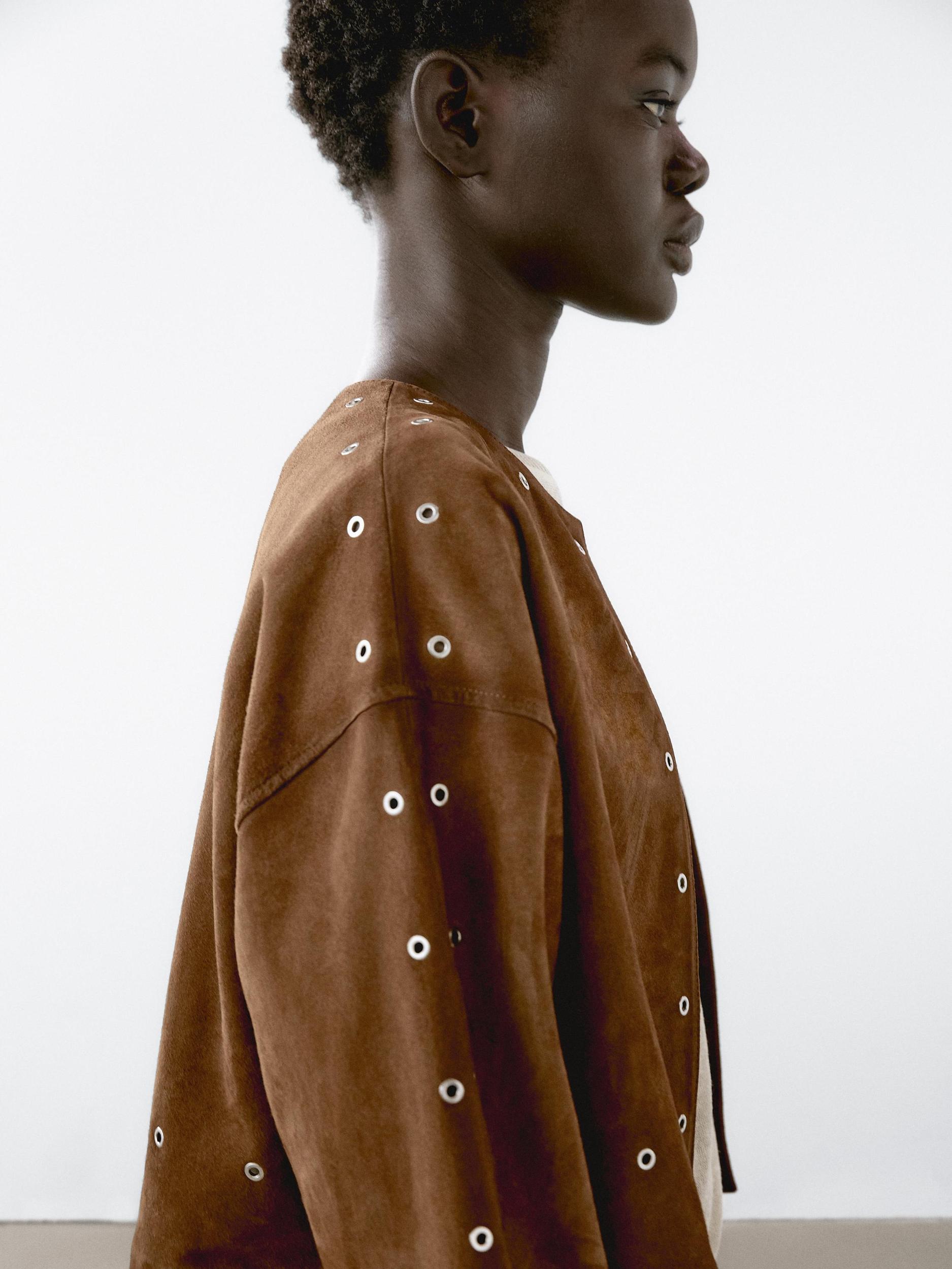 Suede leather jacket with eyelets Product Image