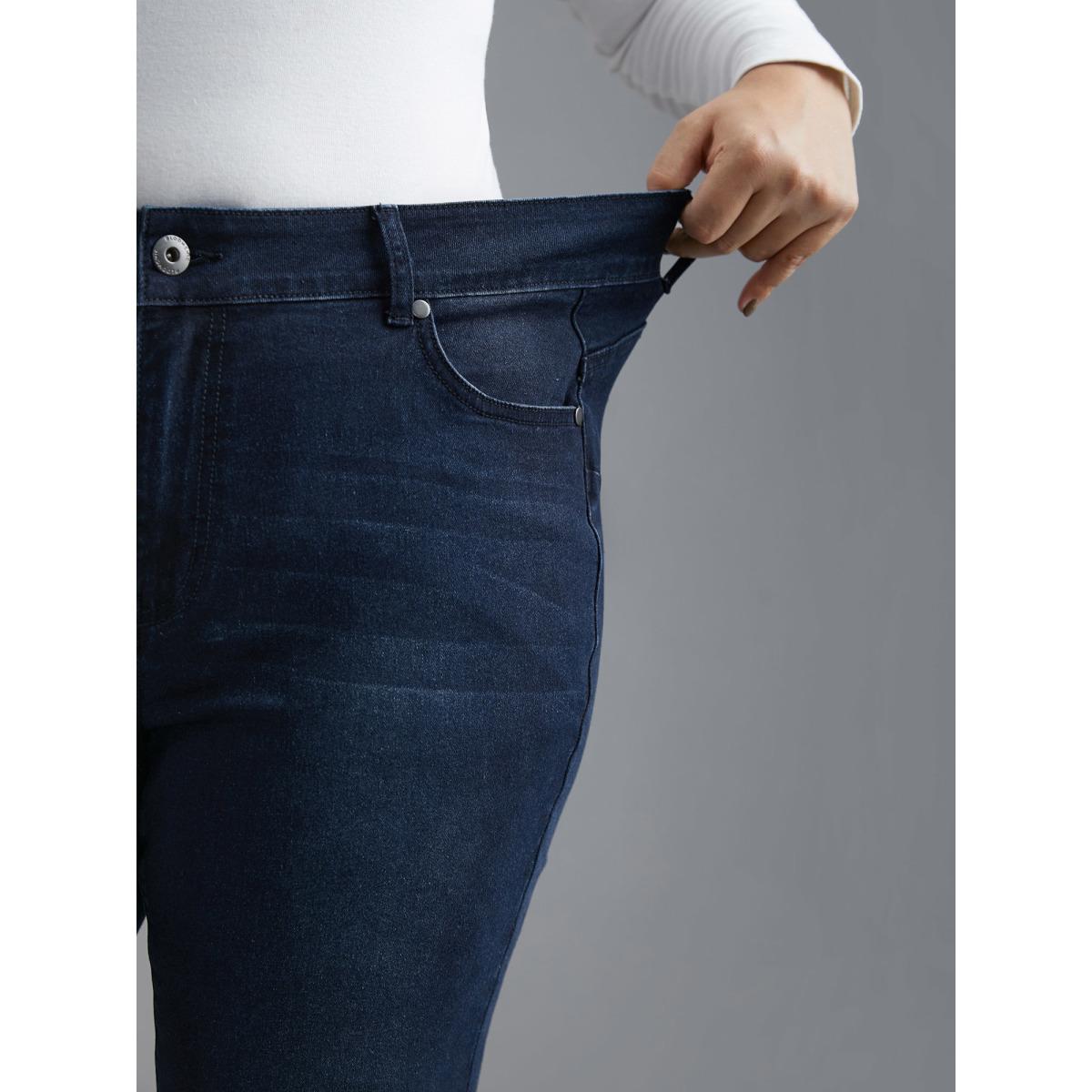 Plus Size Booty-Lifting Skinny Fit Mid-Rise Jeans Women Denimindigo Elegant Button Medium stretch Slanted pocket Jeans BloomChic 22/3X Product Image