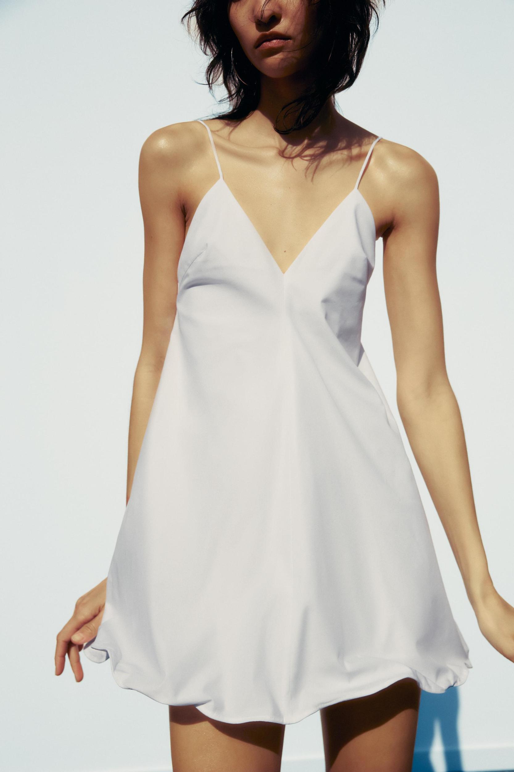 SHORT MOLDABLE HEM DRESS Product Image